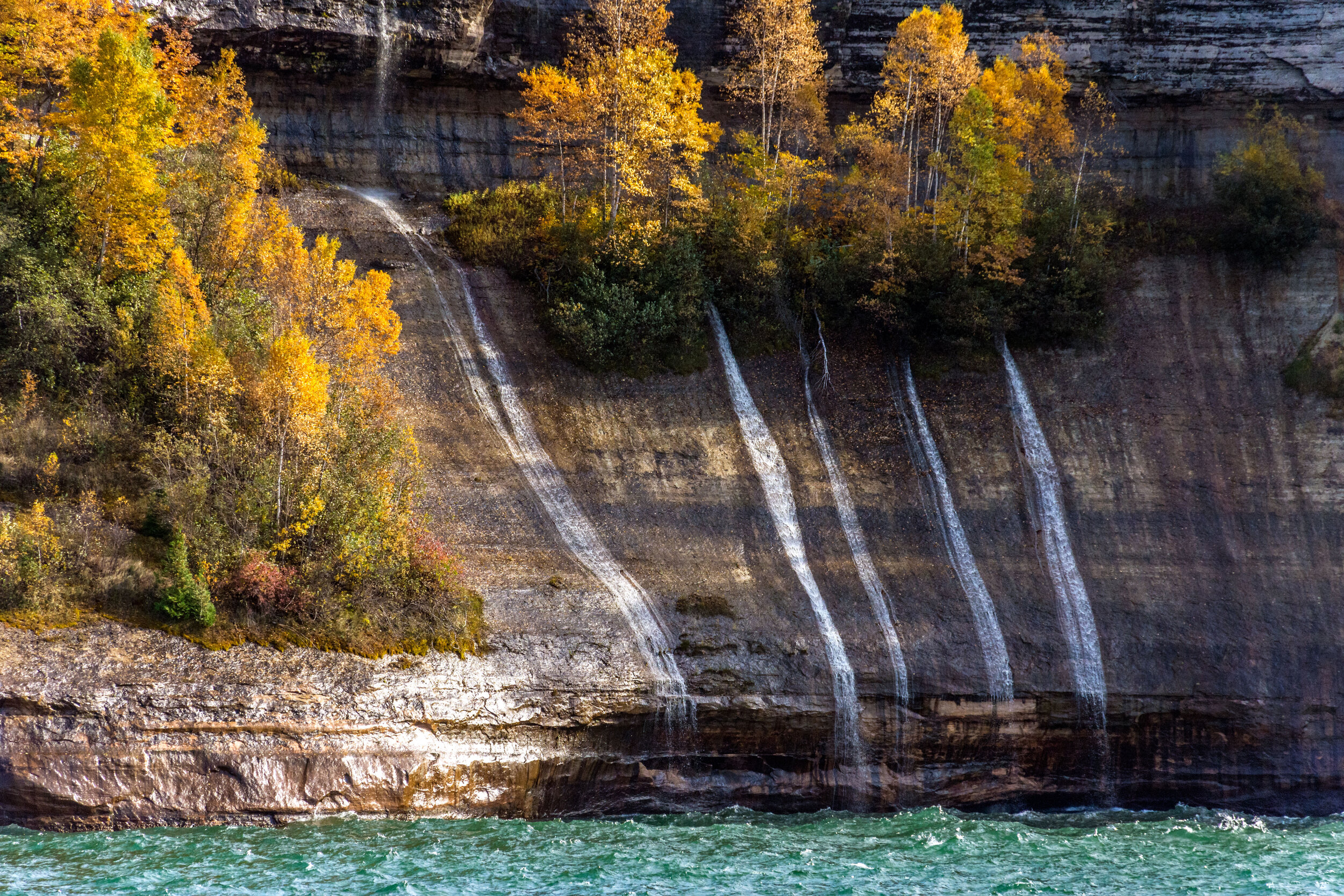  A Cluster of Small Waterfalls on the Picture Rock Boat Cruise in Northern Michigan 