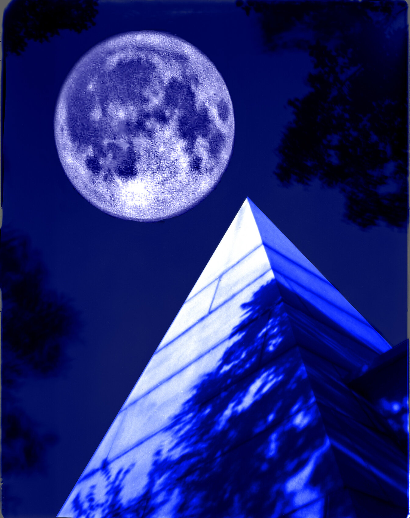  Film Image: 4x5” Pinhole Camera negative combined with 35mm negative of moon with dark blue mono tones in Photoshop. Pyramid image shot in daylight. 