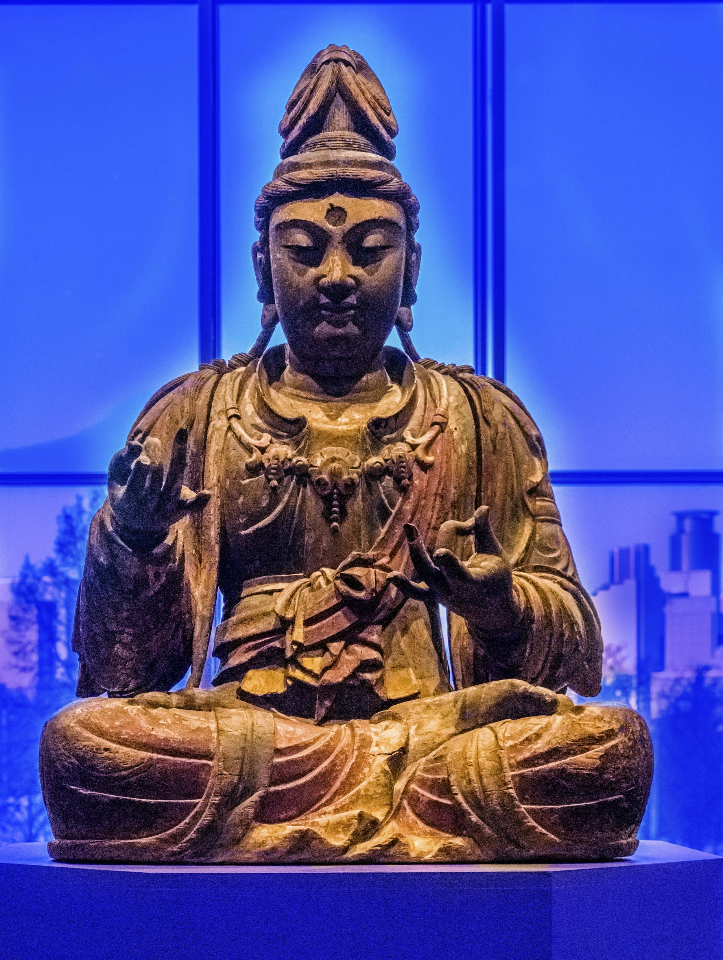  I photographed this Buddha statue in the Minneapolis Art Institute. In Photoshop I added some color layers to make it more mysterious. 