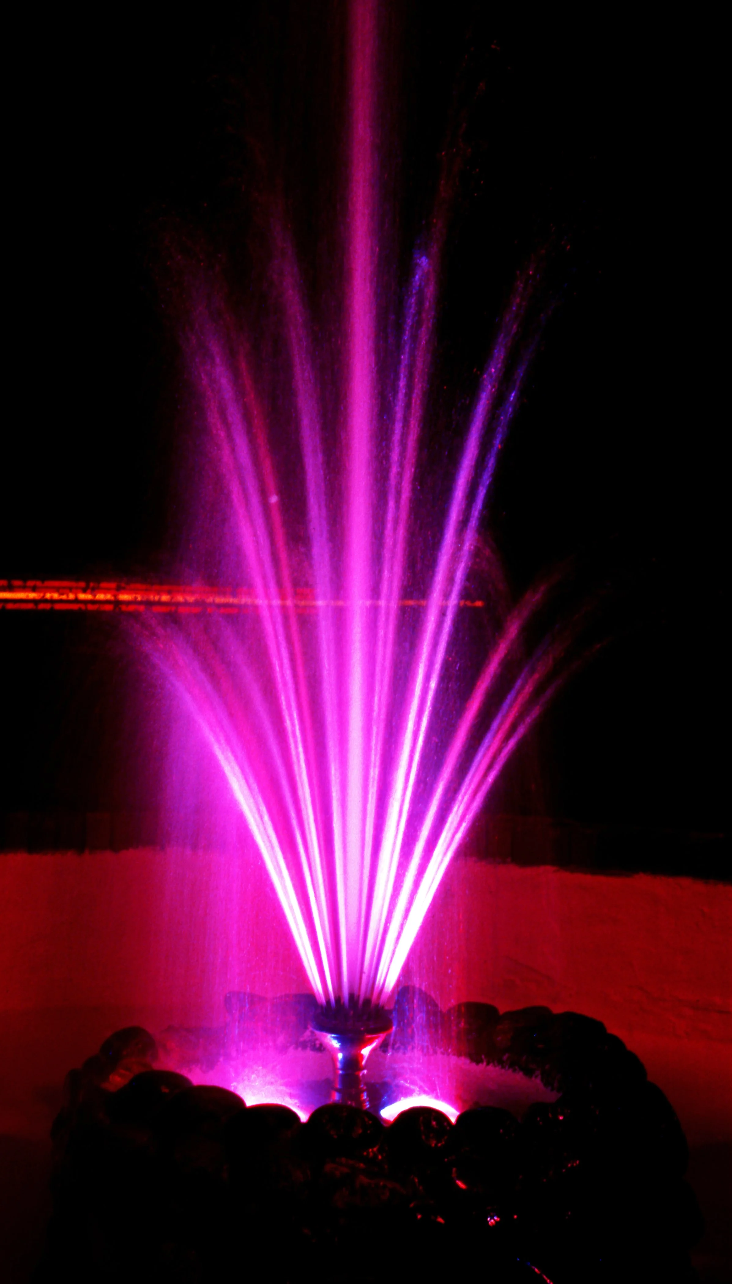  I used to photograph for the hospitality trade. The owner of this motel wanted me to do some slow exposures of his water fountain. I photographed it with Kodak Ektachrome. 