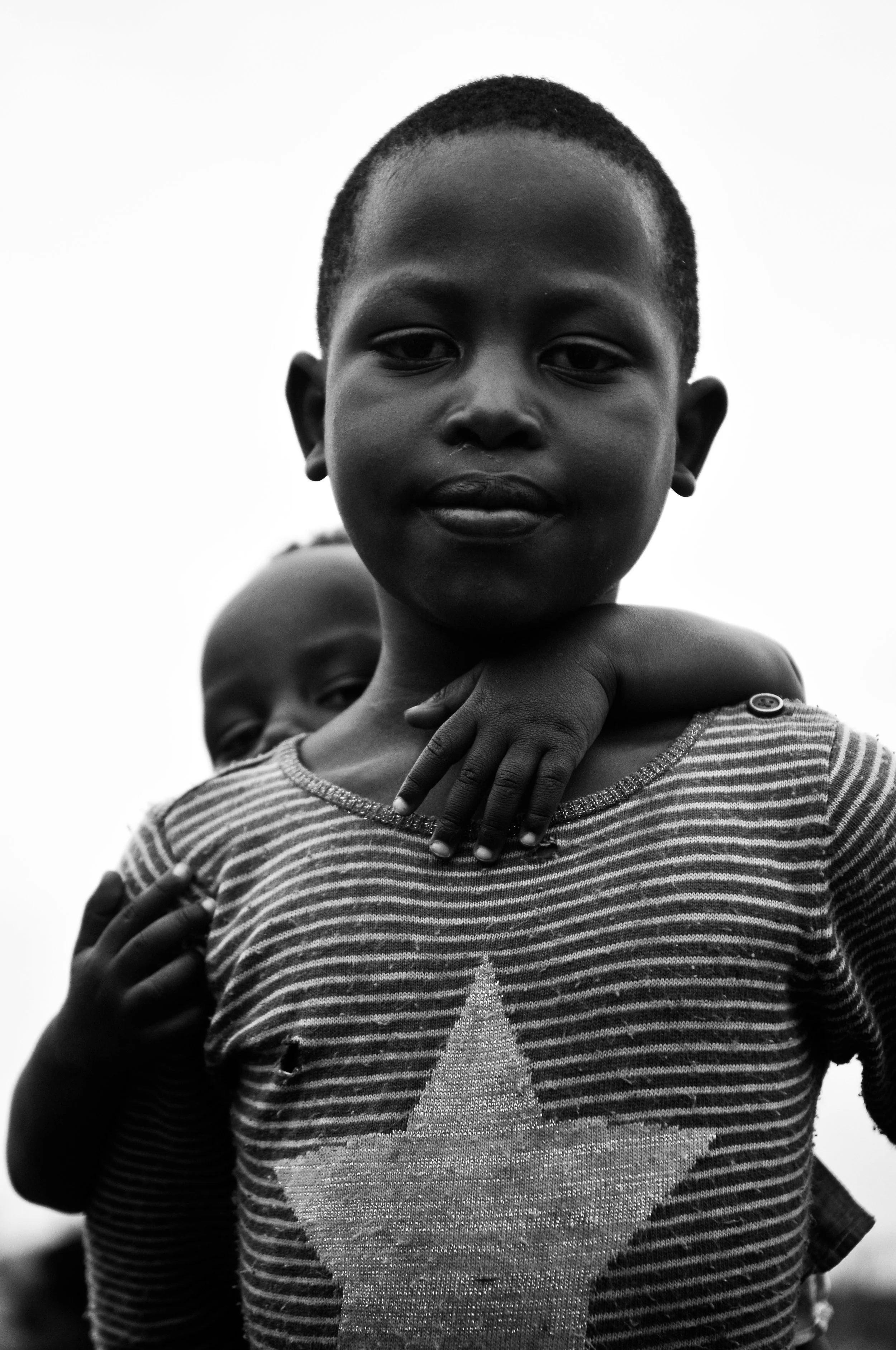 Congolese Girl Piggy Back.jpg