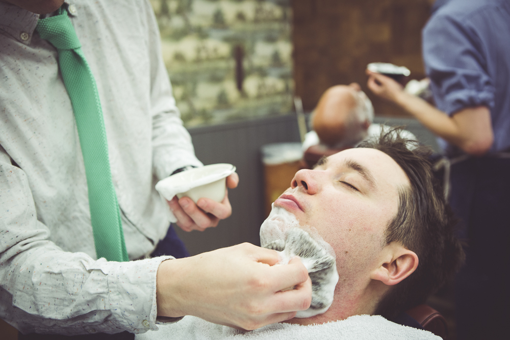 Groom having a shave