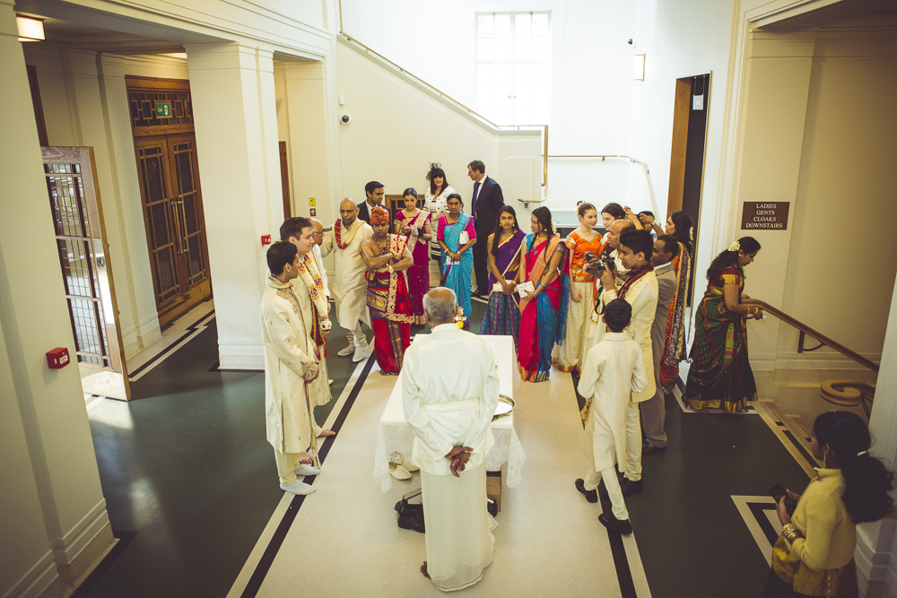 wedding guests arrive at Hackney Town Hall