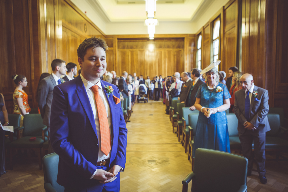 groom awaits his bride