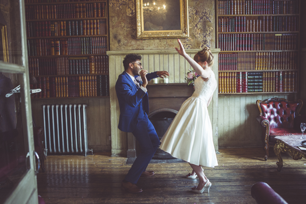 Dancing bride and groom