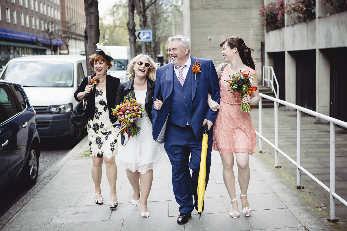 Brides family walking to Camden Town Hall
