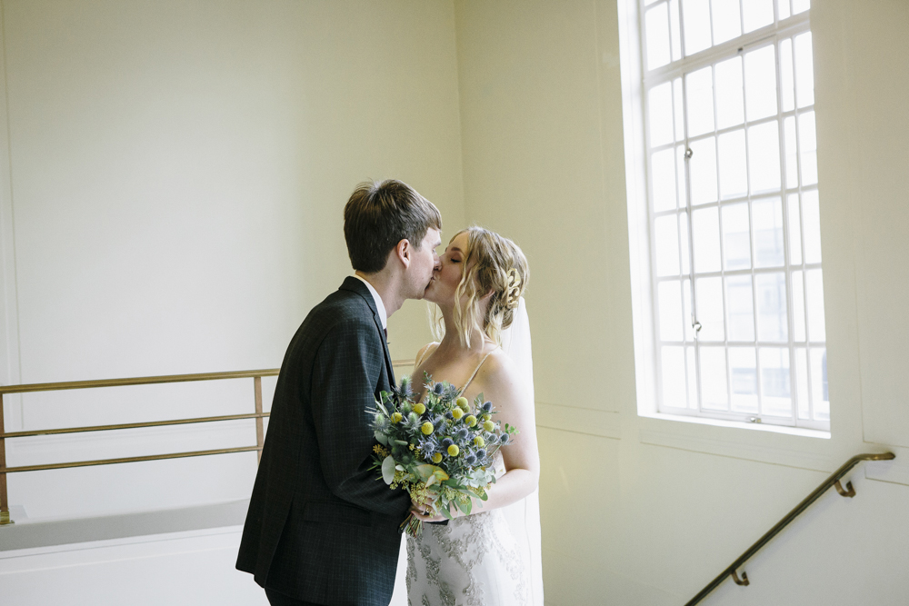 Kissing on the stairs of hackney Town Hall