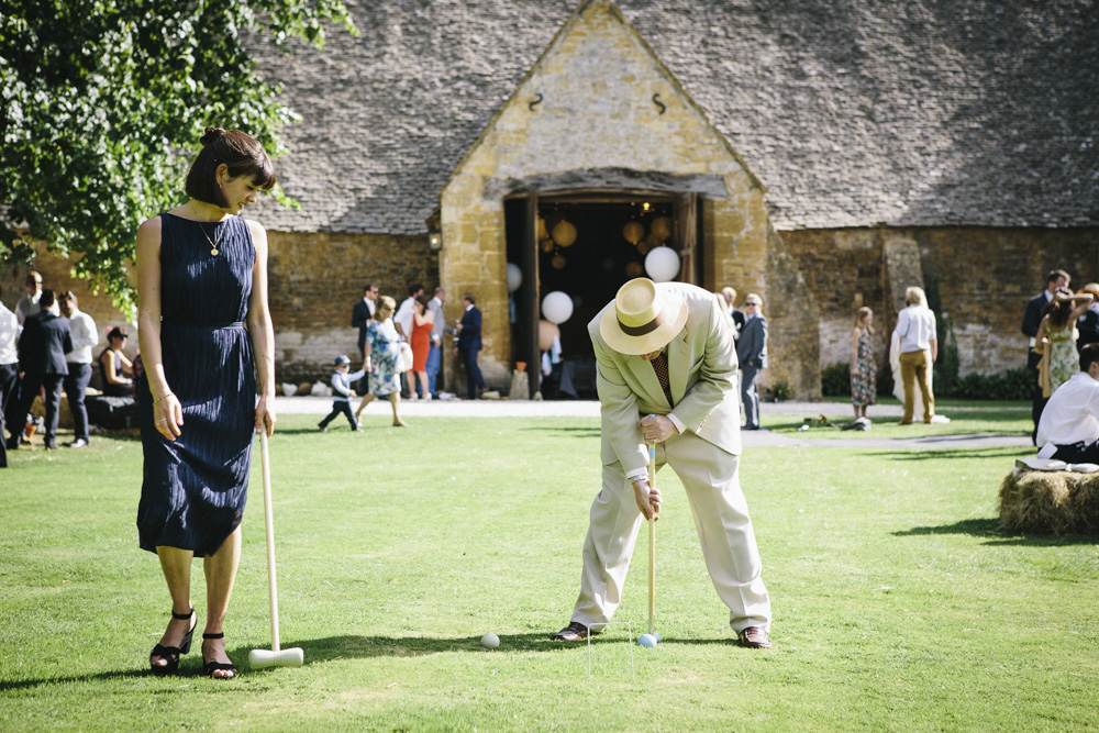 guests playing croquet