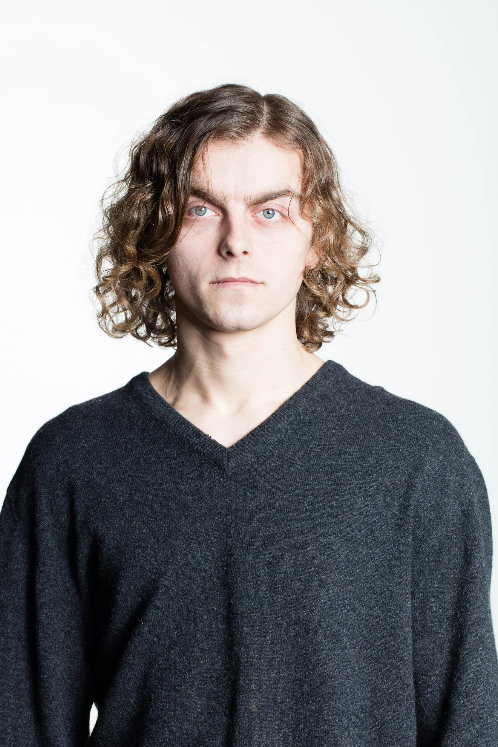 Originally from Tomaszow Mazowiecki, Poland, Mariusz Kujawski dances with ZEST Collective and Equus Project. When his family moved to Iceland he began to participate in Ballroom Dance competitions with Gurney Osk Karlsdottir. They won the Icelandic National Championships in both the 18 and up division, as well as the adult division in 2009 for Latin American style. Kujawski graduated from the University of Wisconsin - Stevens Point with a Bachelor of Arts in Dance. After graduation he and his wife Emma Fitzsimmons moved to New York City.