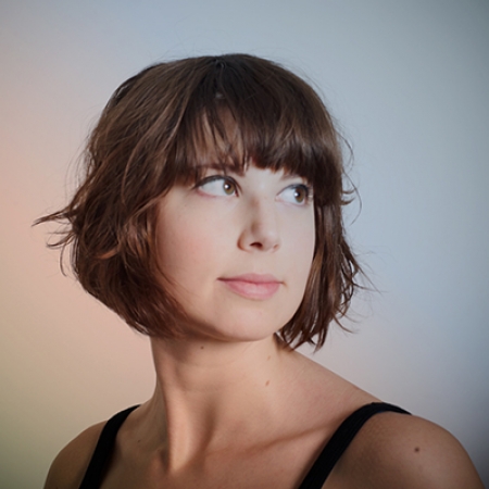 Emma Fitzsimmons is from St. Paul, MN and graduated with a BFA in Dance from the University of Wisconsin-Stevens Point. She is part of ZEST Collective and Soluq Dance Theater. Emma choreographs dance works and also choreographs with her partner Mariusz Kujawski.