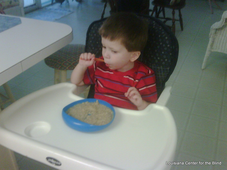 Jordan feeds himself with a SPOON!