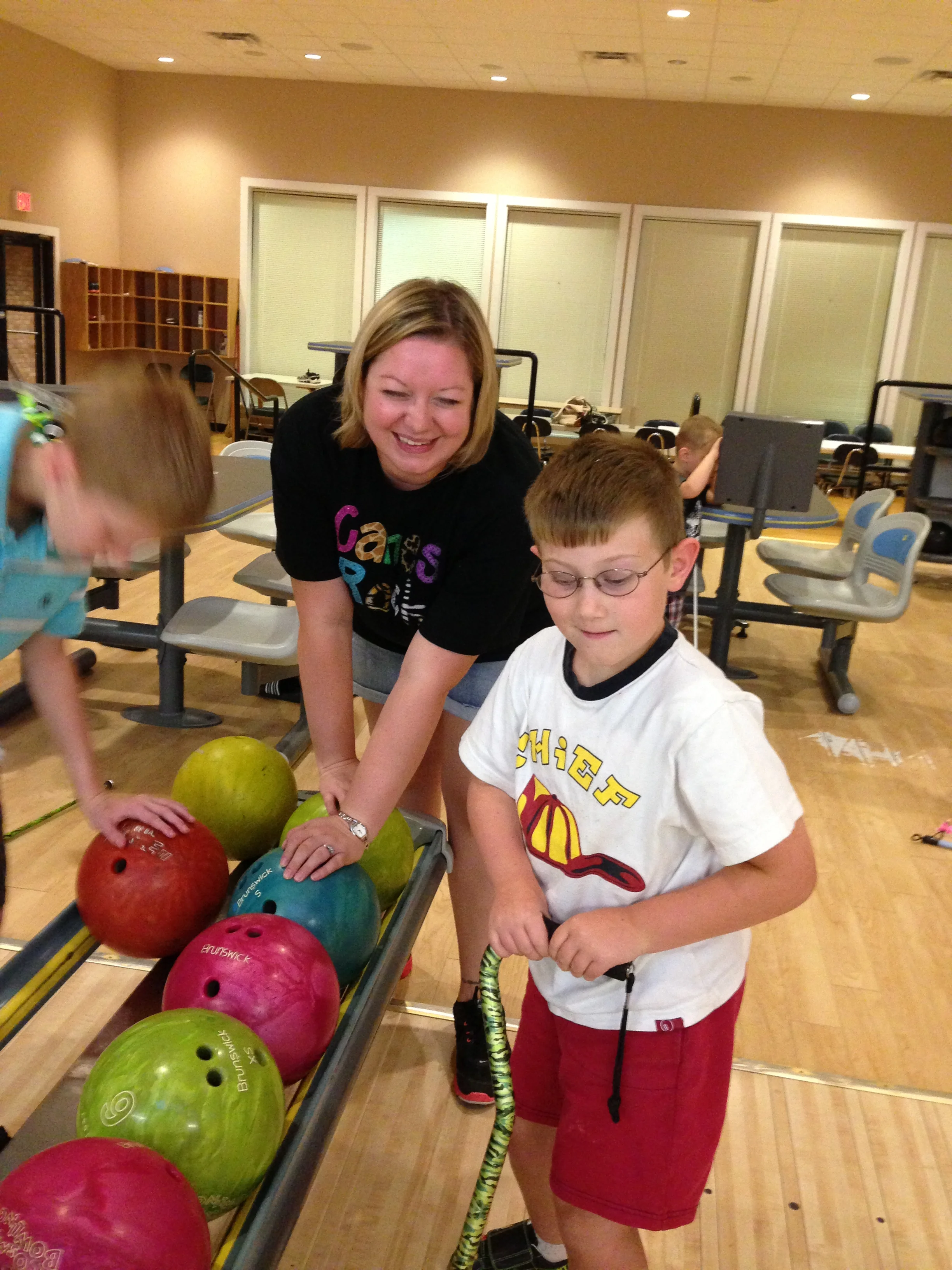 Nicholas prepares to bowl