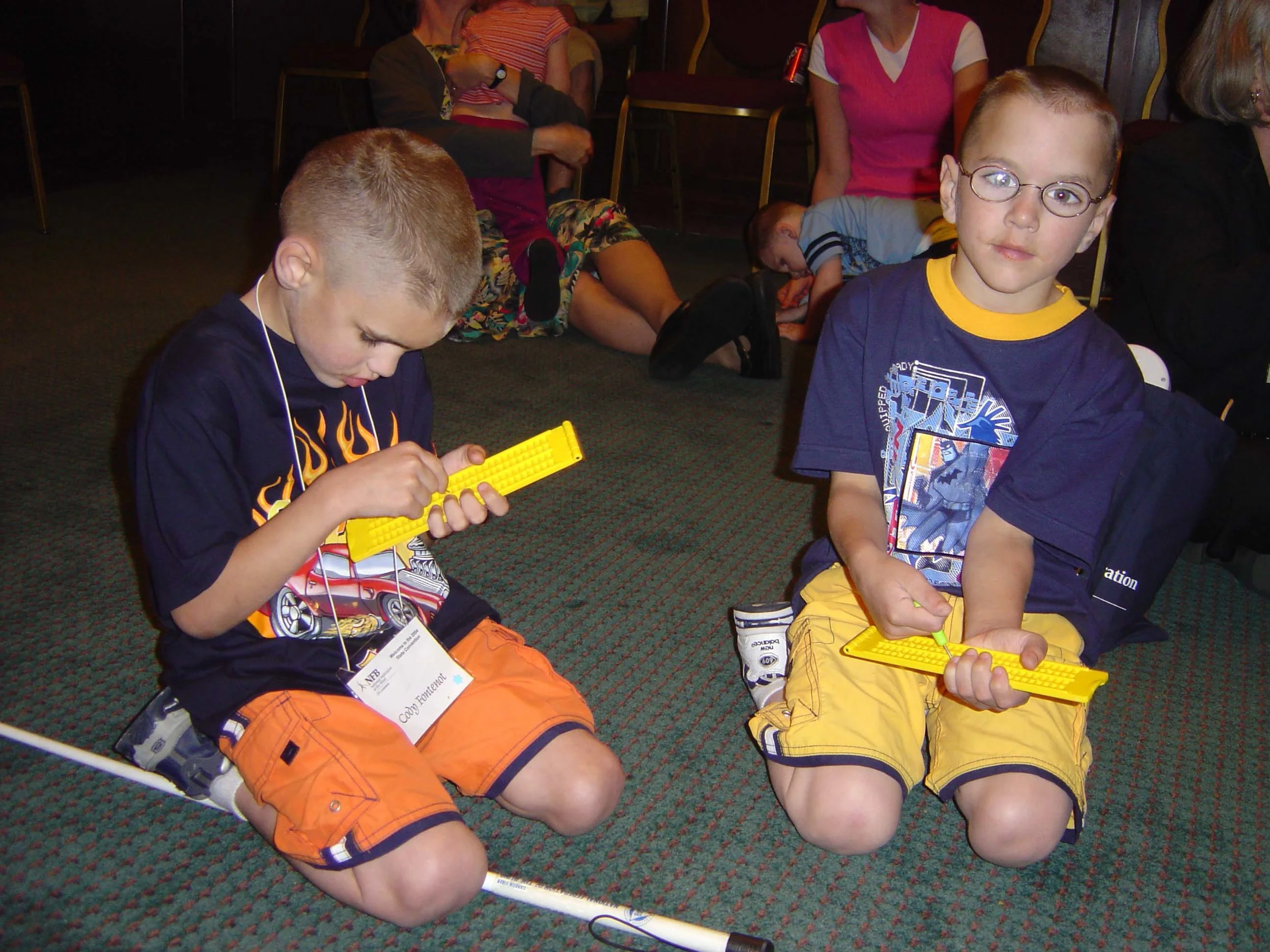 Early Steppers Cody and Caleb explore slates at State Convention 2004