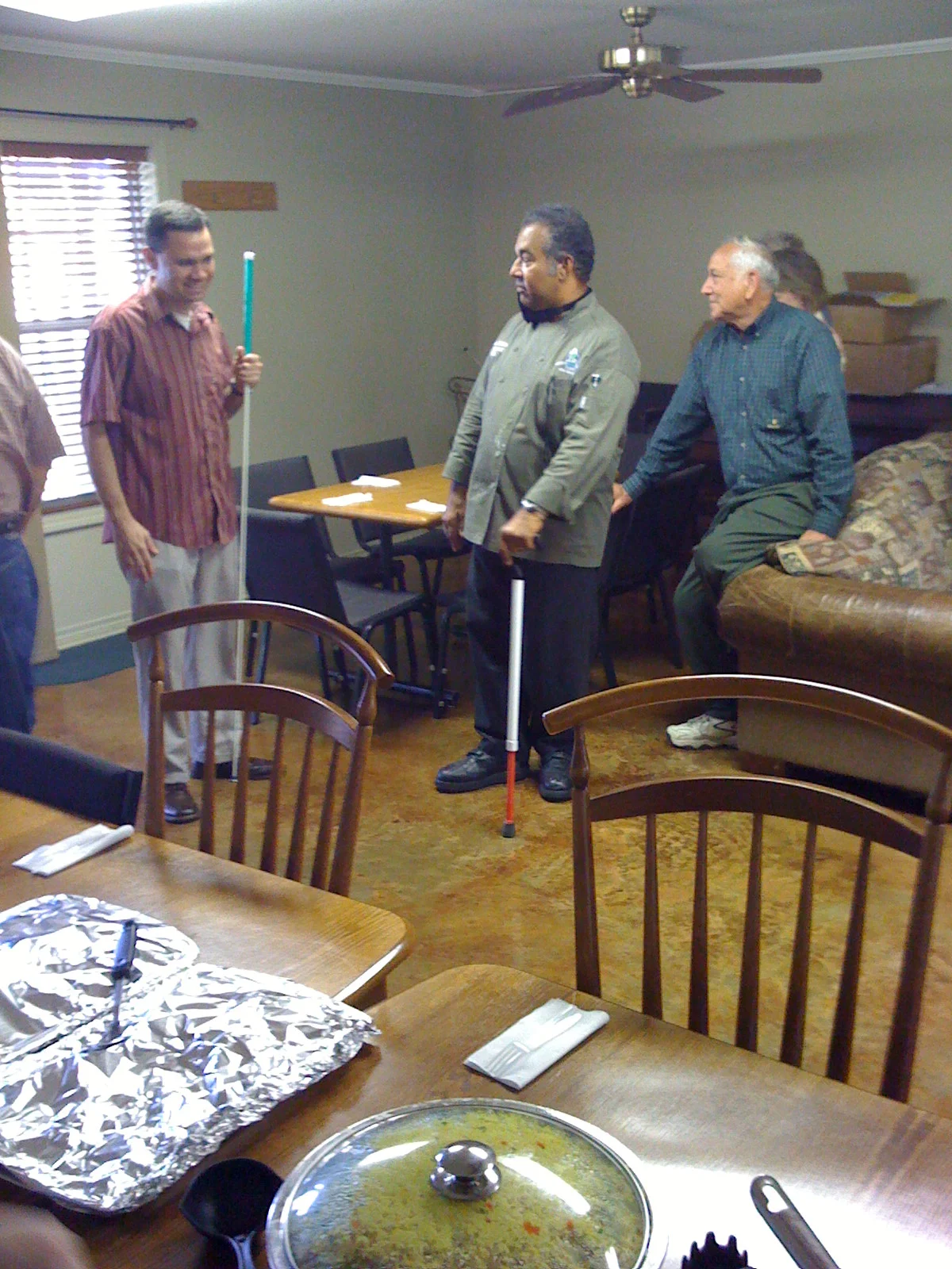 Ronnie and Dean talking to Josh during senior retreat