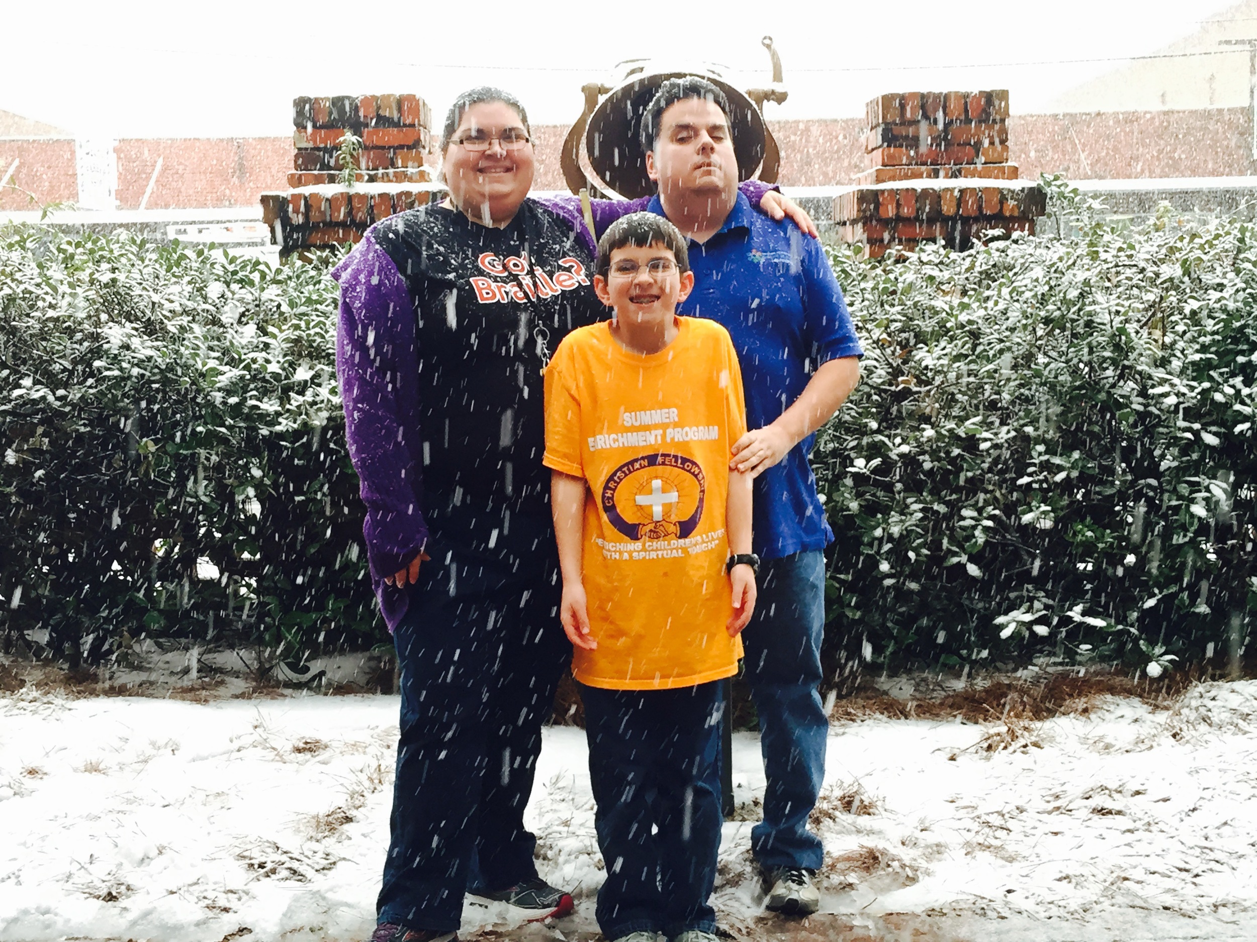 Eric, Krystal, and Austin Guillory enjoying the snow at LCB.jpg