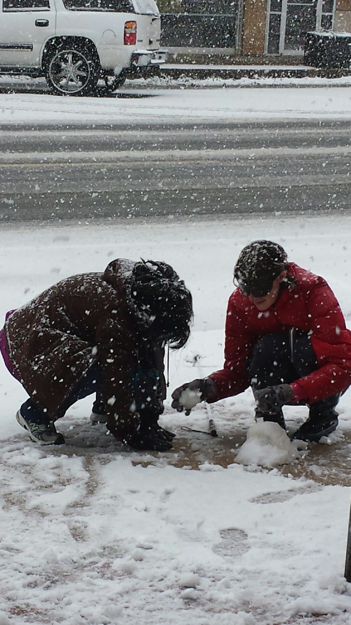 Kelly and Kayla gather snow