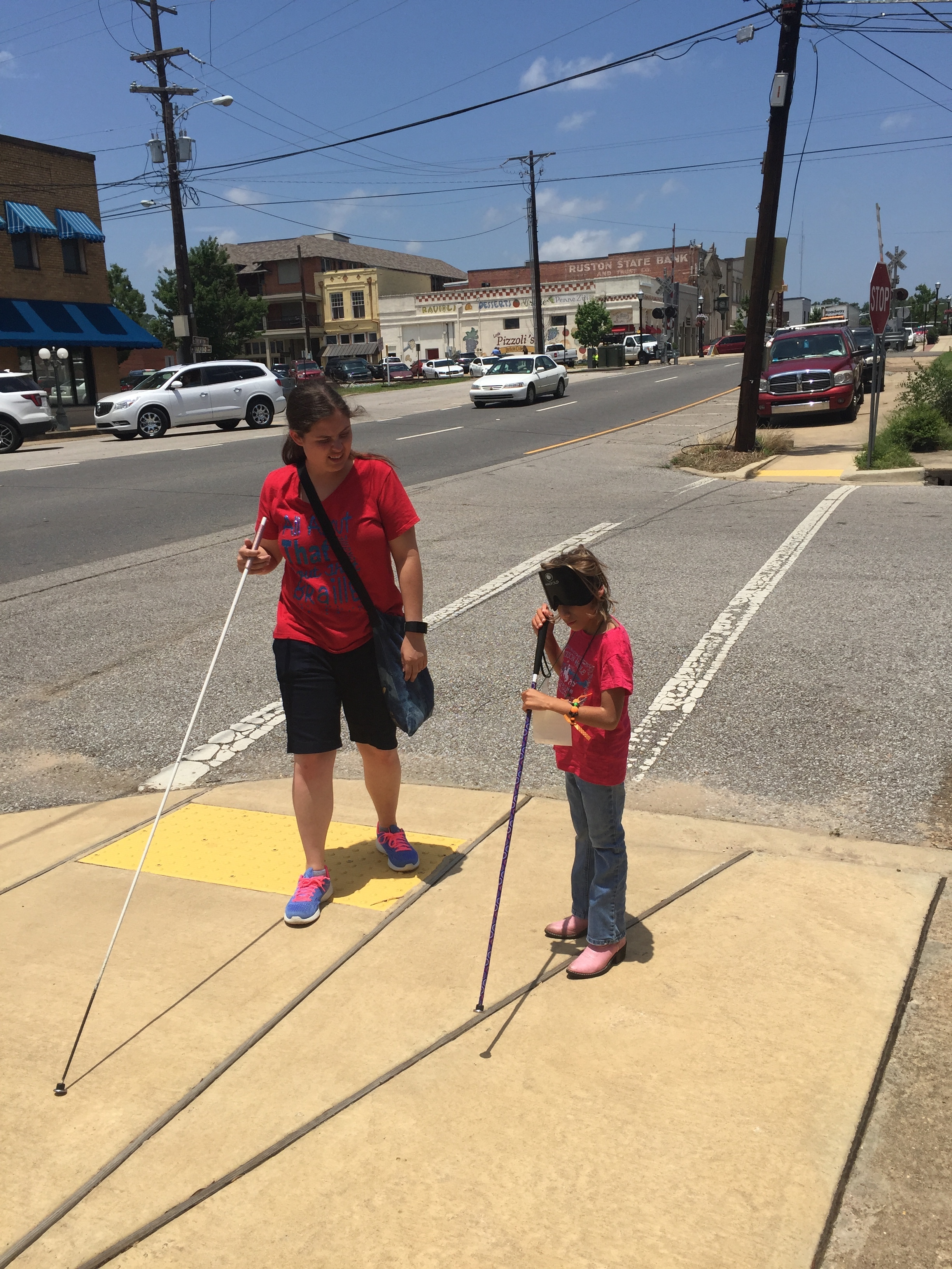 Jolie and Ms. Stephanie after a safe street crossing