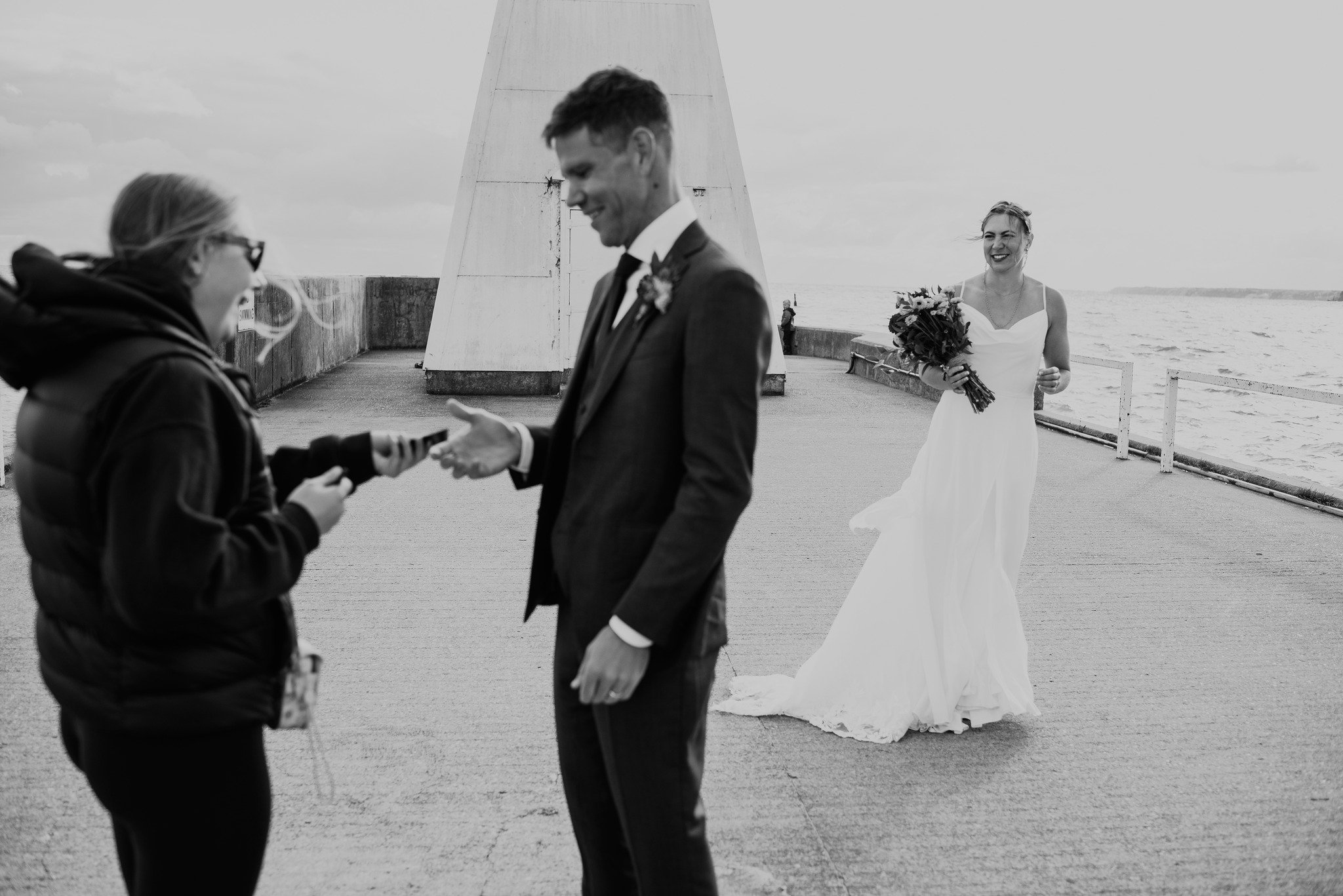 A passerby took a cute polaroid of the couple I was photographing. The groom had her sign it.❤📷