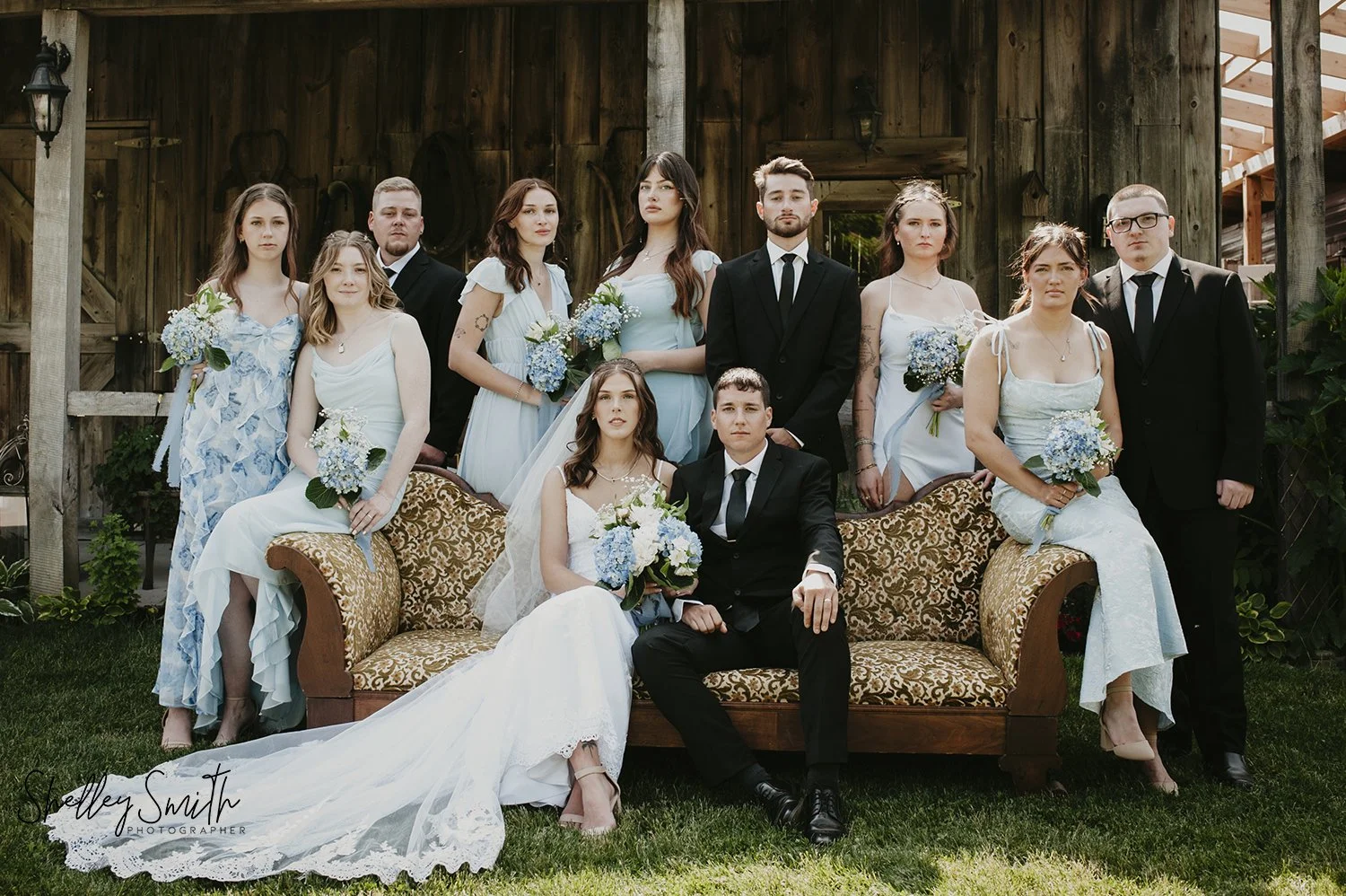 Wedding Party in front of barn at Windecker Woods Flower Farm