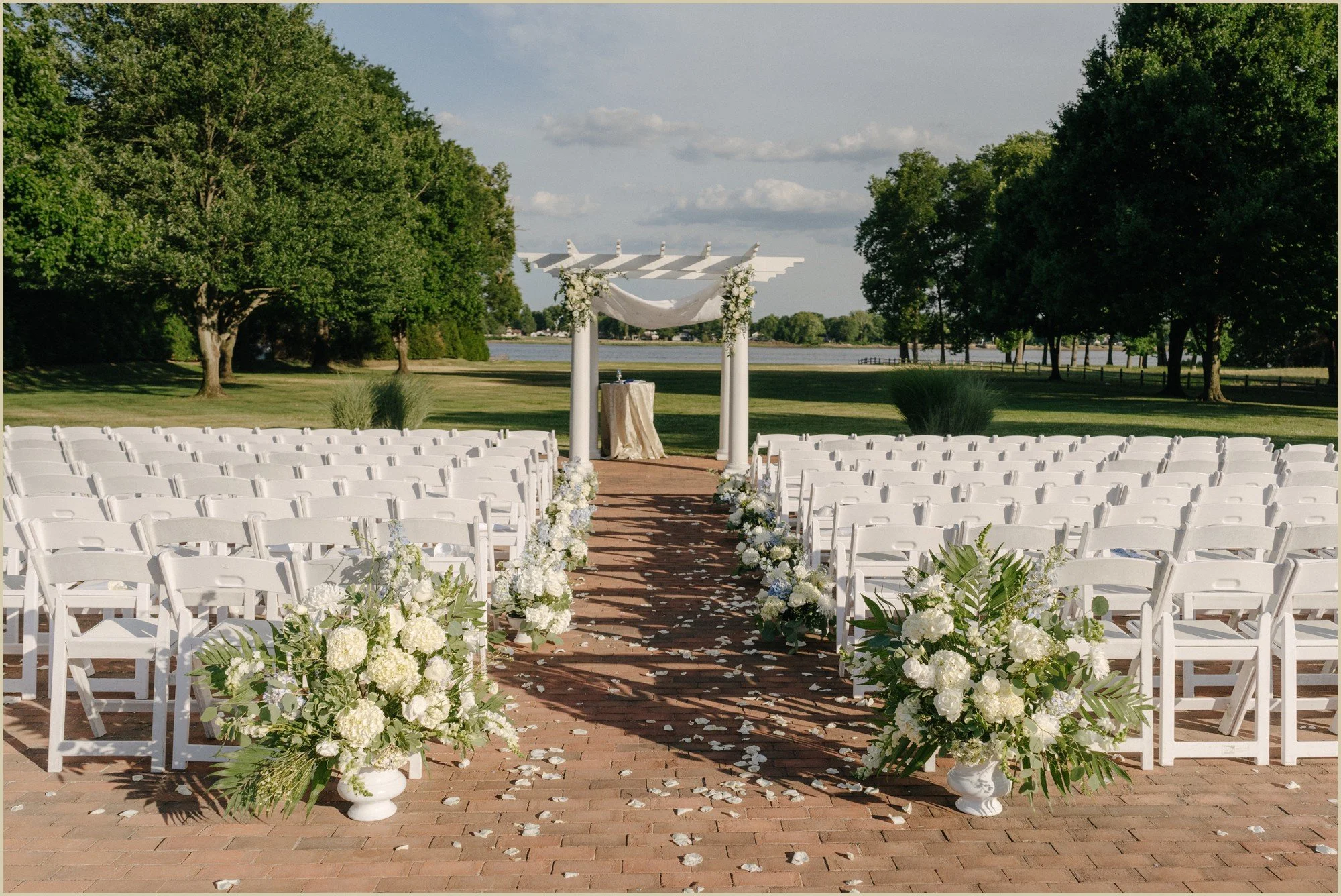 ceremony space at pen ryn estate with neutral light florals