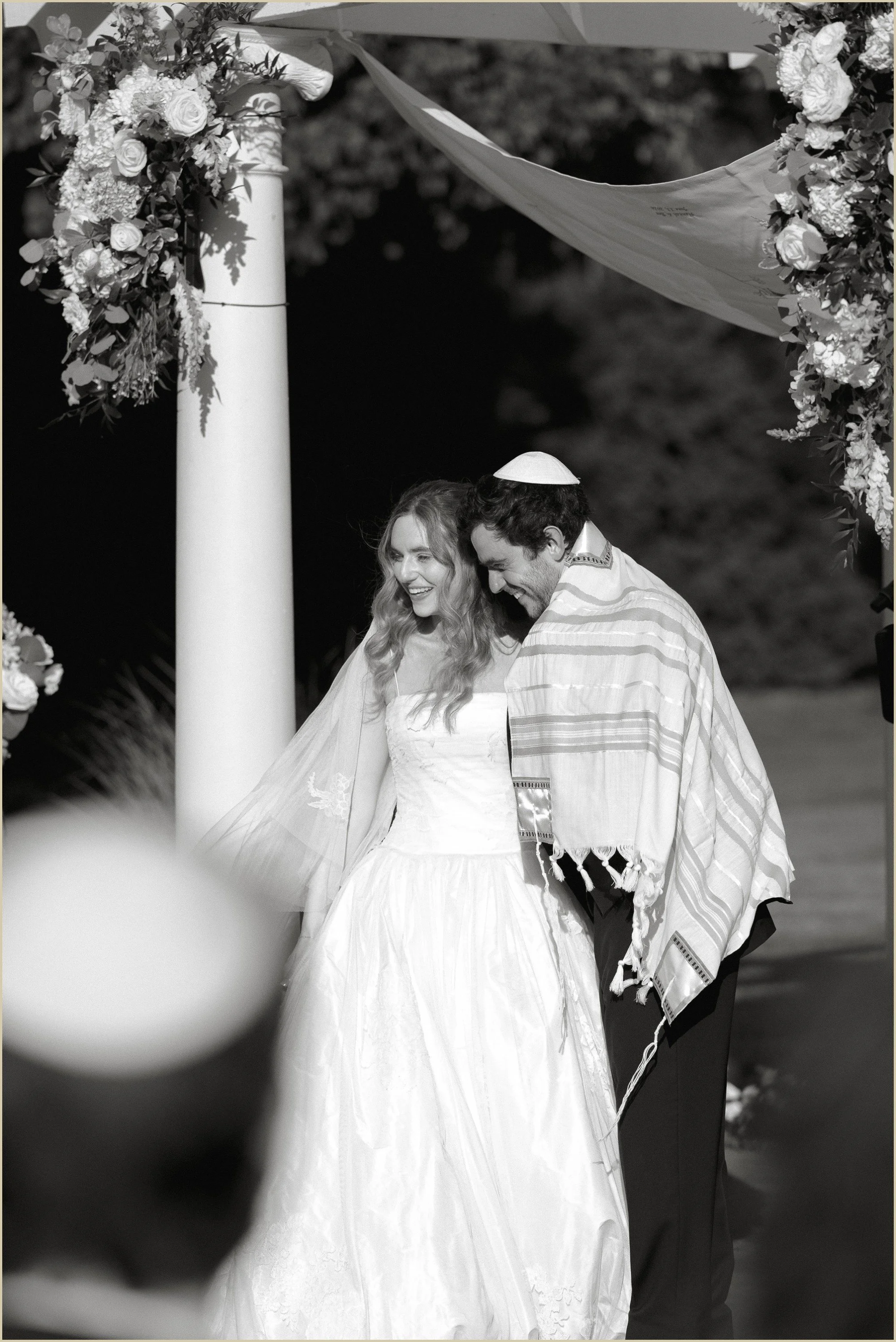bride and groom during jewish wedding ceremony