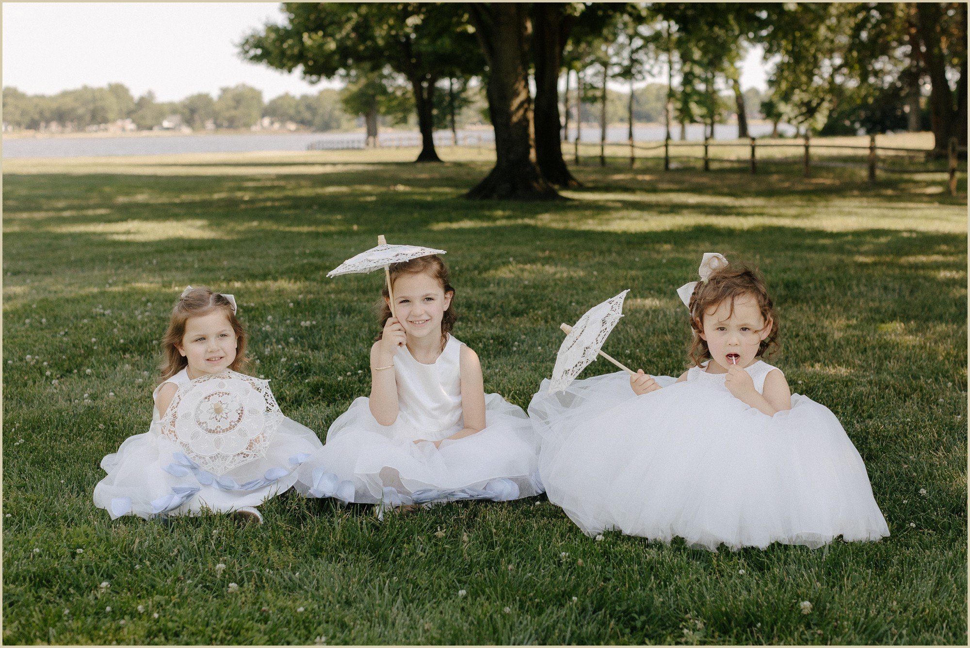 flowers girls holding parasols