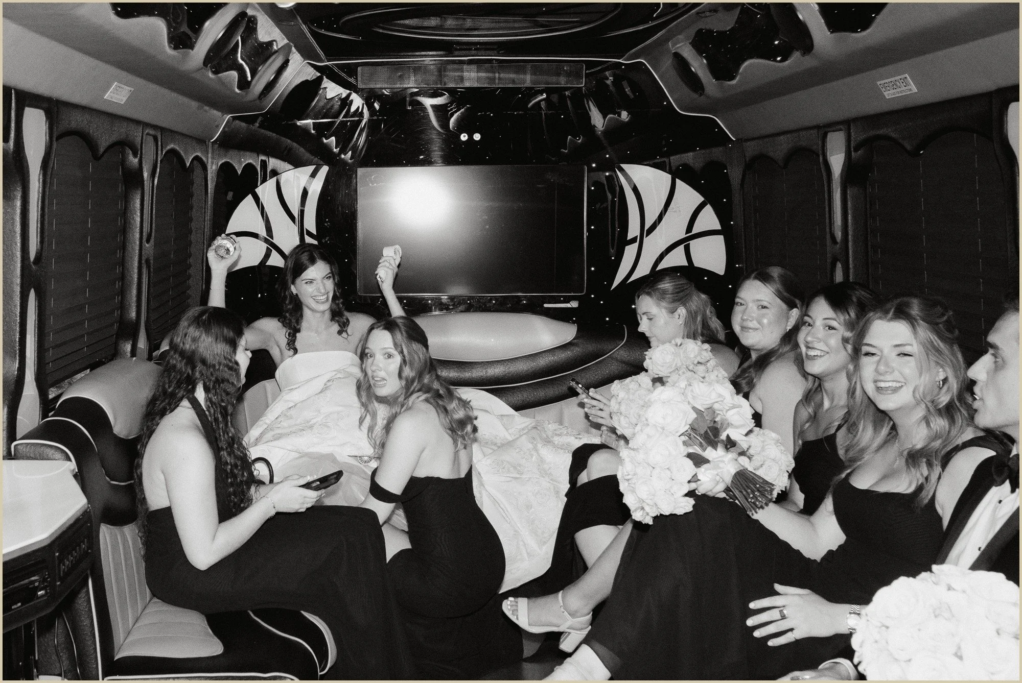 direct flash candid of wedding party in limo going to the church