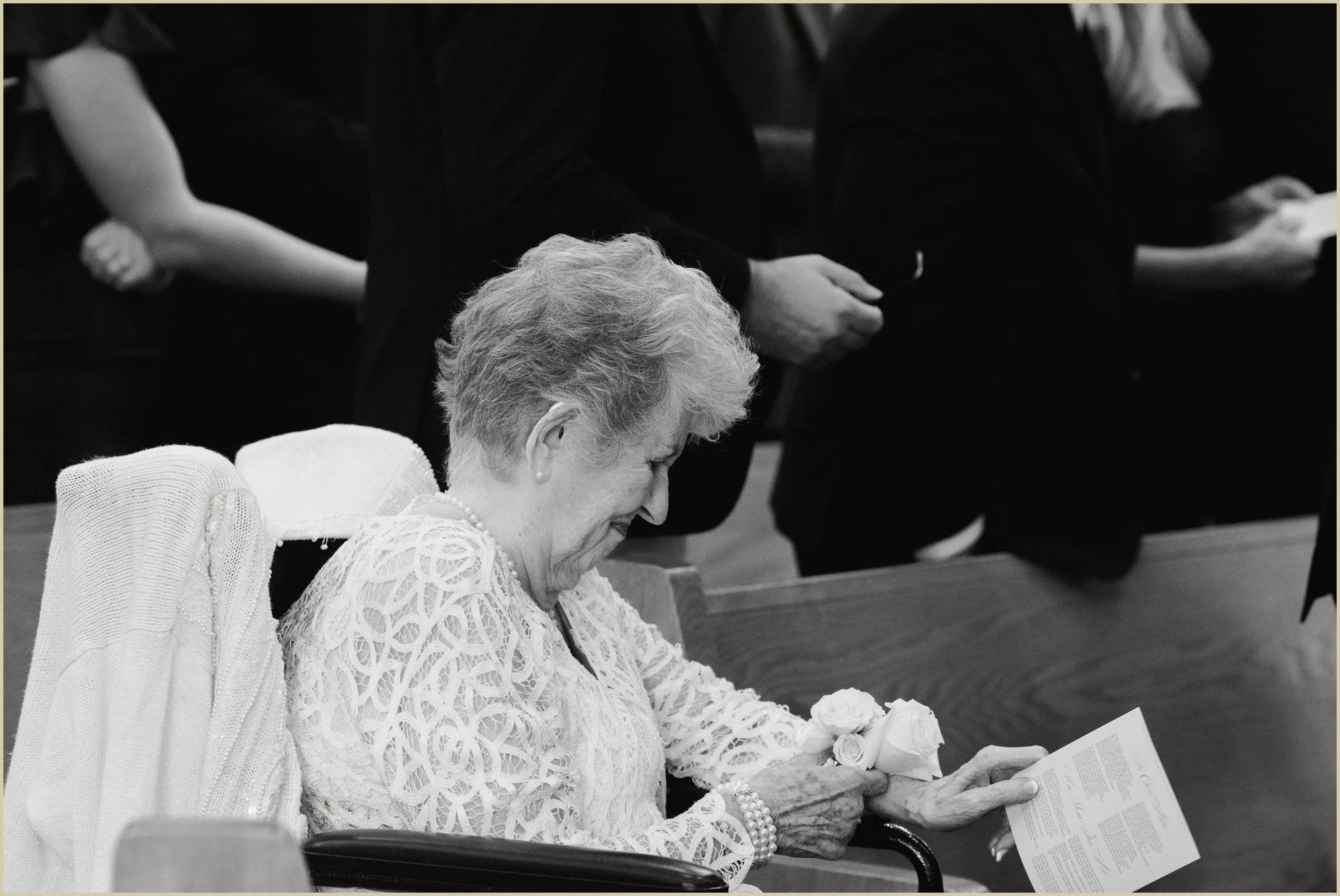 candid photo of grandmother look at her flowers