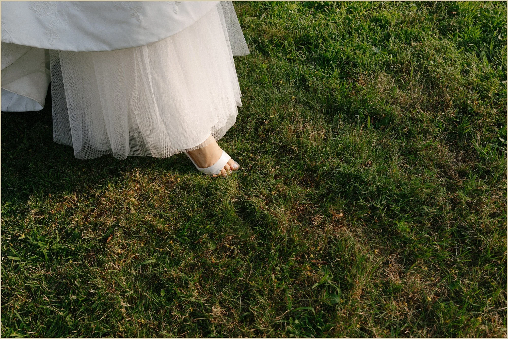 film detail photo of the bottom of wedding dress