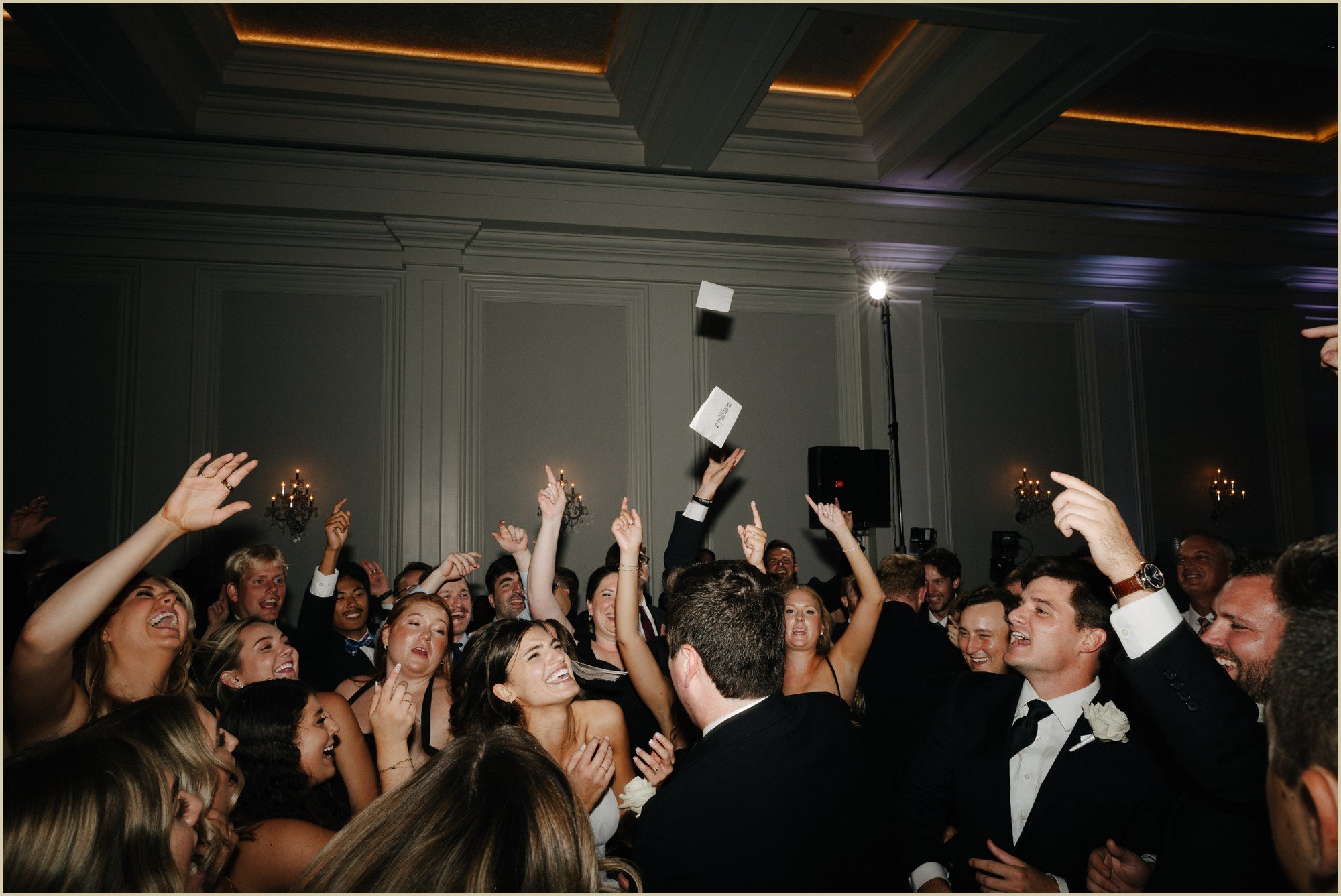 wide photo of a packed dance floor