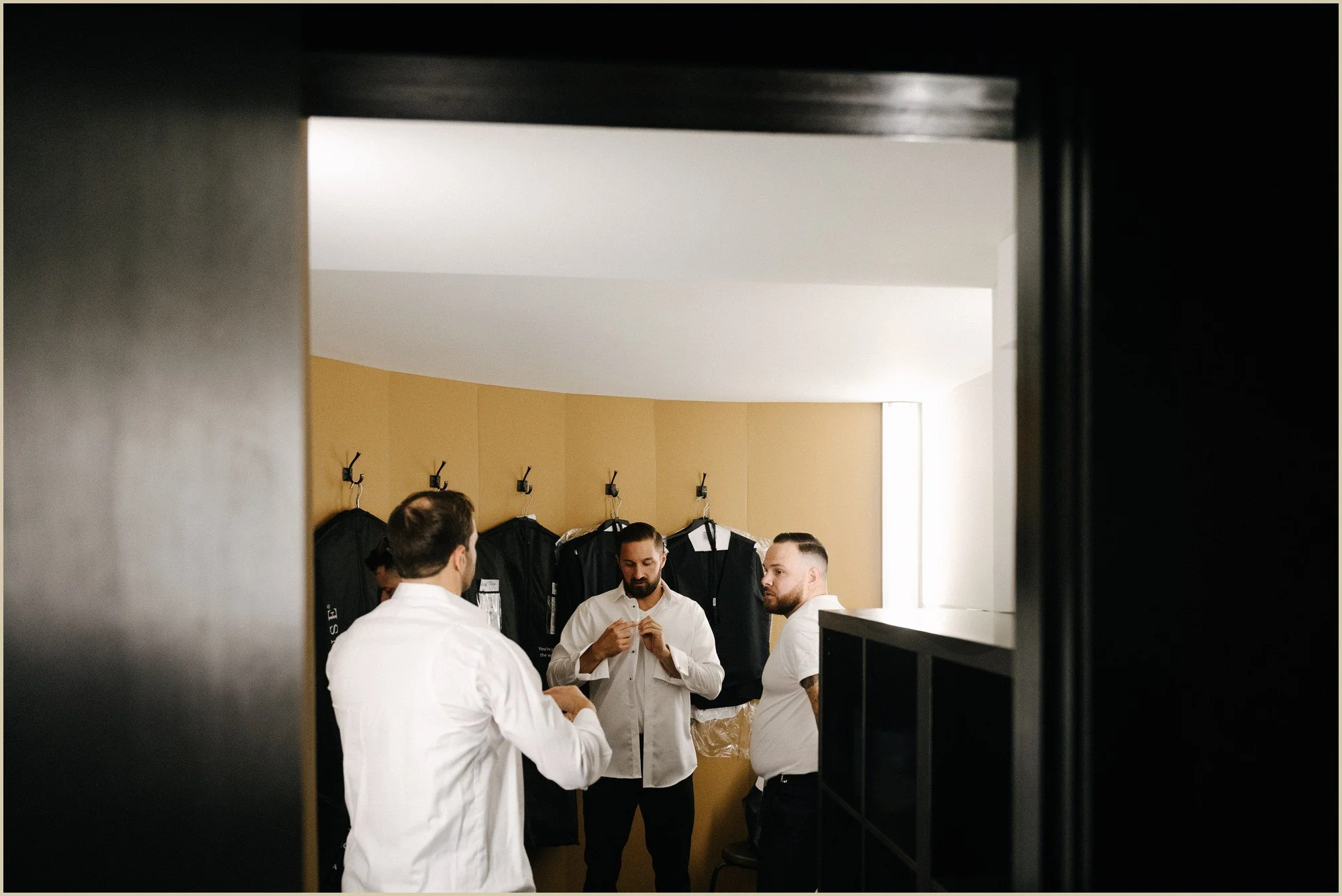 documentary style groom prep photos