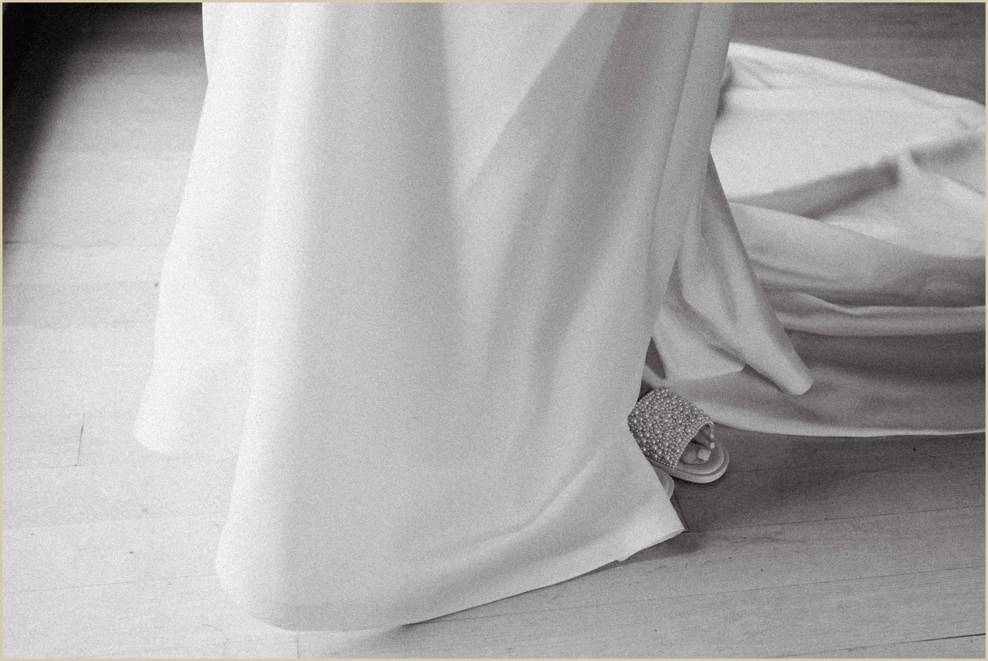 detail of brides slip on flat shoes
