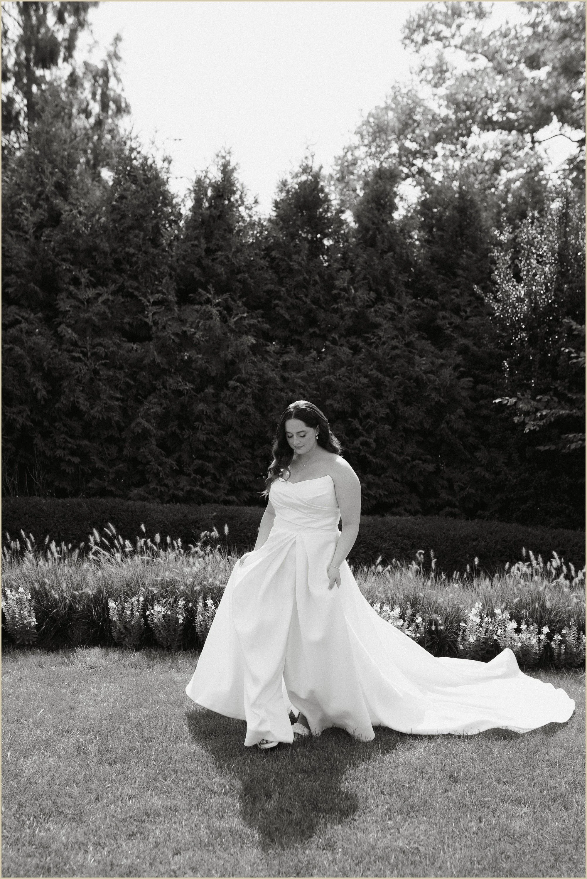 black and white candid photo of bride