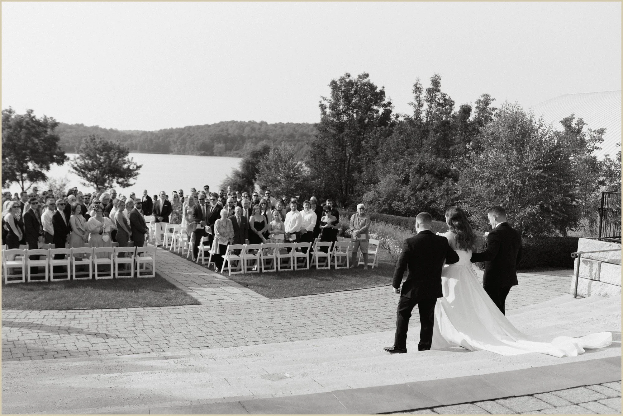 wedding ceremony as bride walks down the aisle