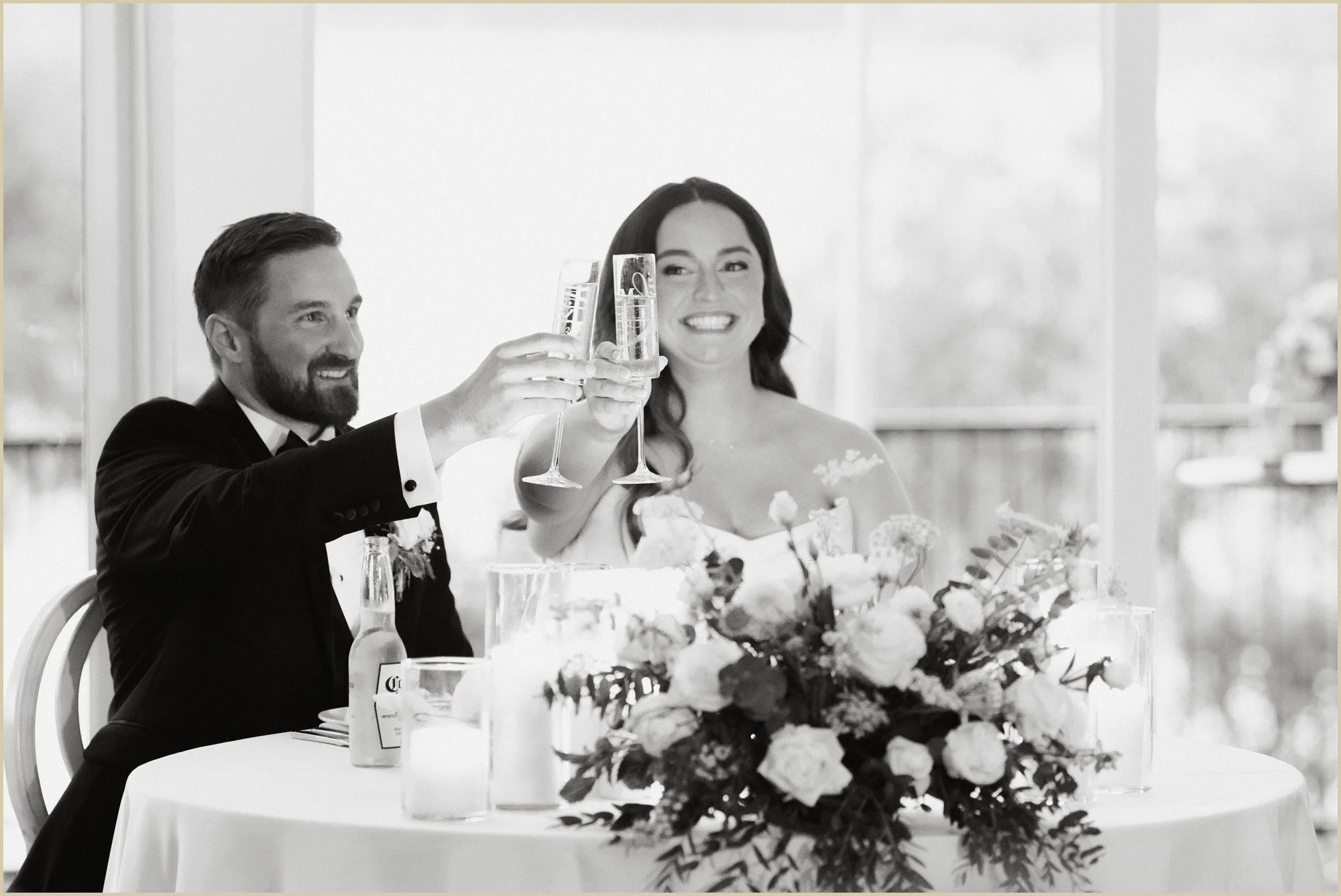 bride and groom toasting