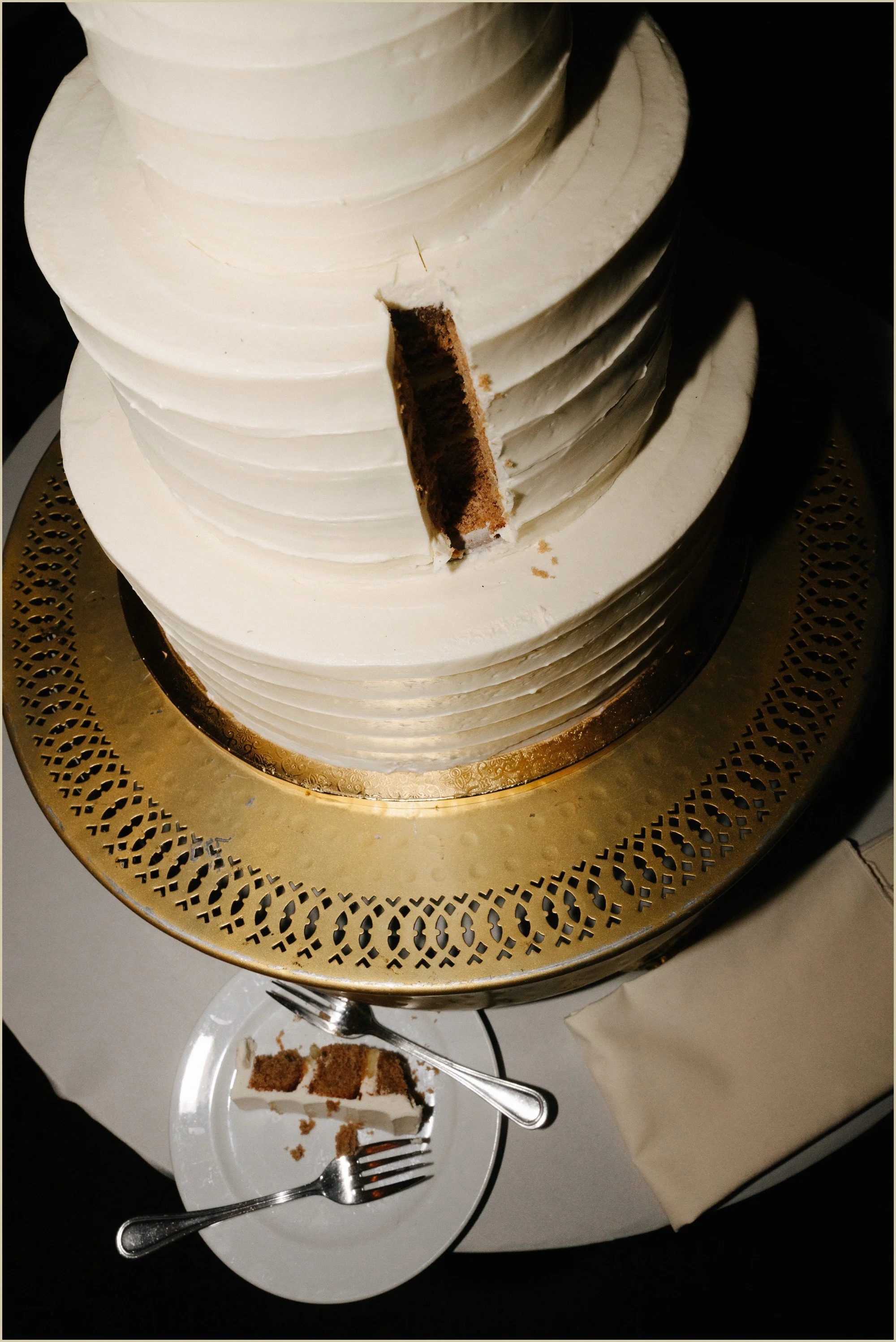 wedding cake after it's been cut