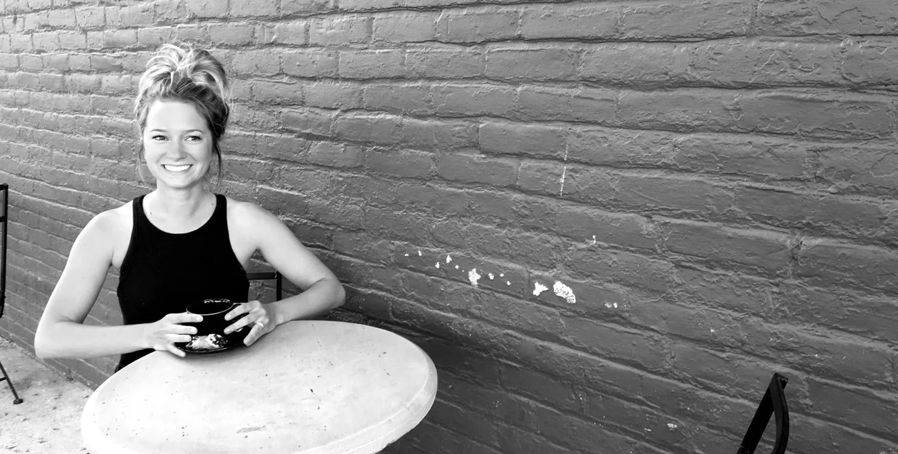Brittany (Brubaker) McNeil, owner The paths of grading English essays on the beach, knocking out too many rooms of lath and plaster, and assuring tourists that you can indeed surf in Michigan have naturally led Brittany to see her dream of opening her own coffee shop come to fruition. In her spare time (what spare time?!) she enjoys reading a good book or paddleboarding , traveling with her husband, and hiking with her dog, Juni. She is passionate about women in business, black coffee, and lying in the grass by the water on a sunny day. Favorite drink: 8oz Americano