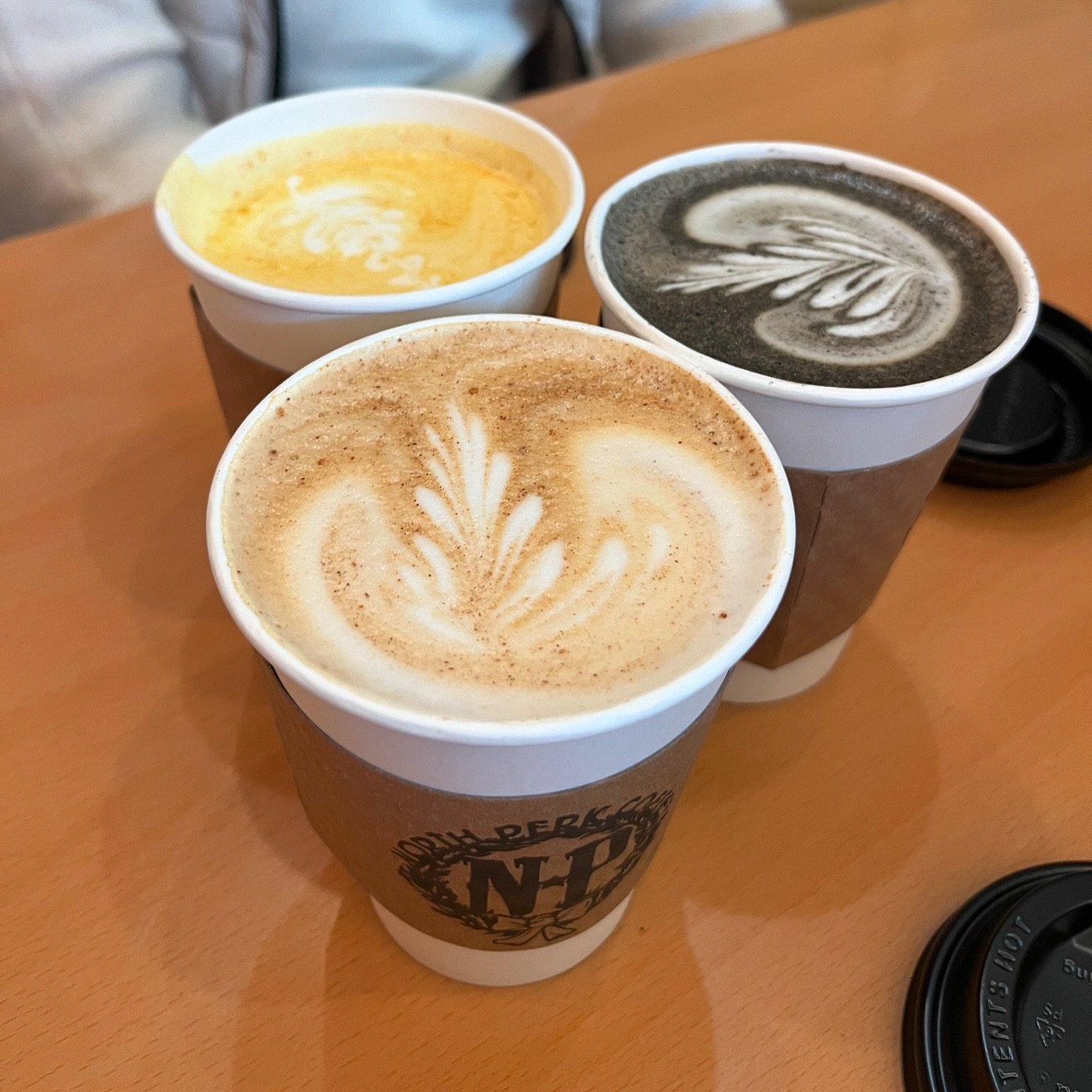 Something for everyone! Turmeric Latte, Charcoal Latte, Chai Tea Latte and Winter Wonderland &mdash; Cheers to a great Sunday 💛

📸 @kylawang @northperkcoffee #northperkcoffee #latteart #tealatte #latte #turmericbenefits #localccoffeeshop #petoskeym