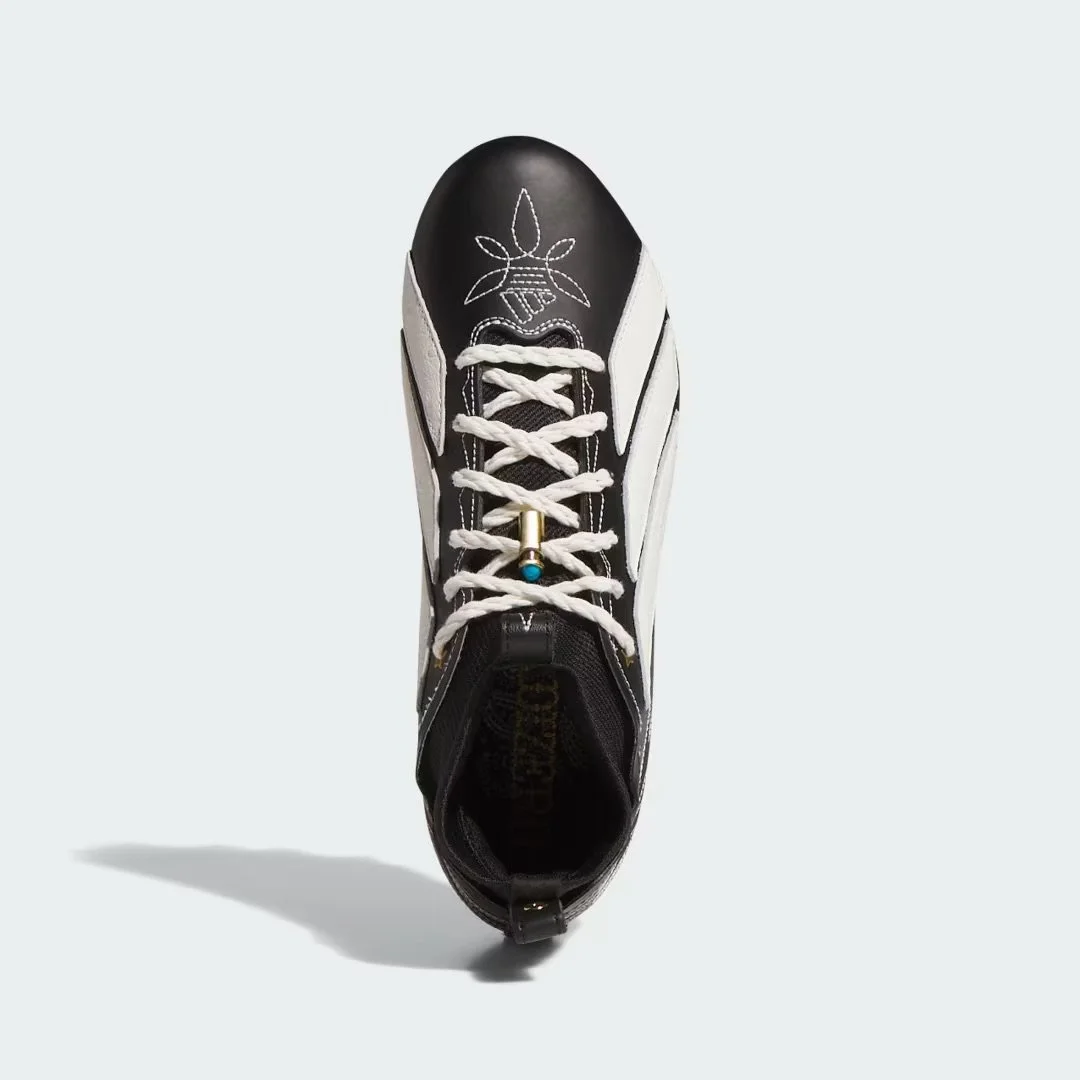 Adizero_Impact_II_Rodeo_Football_Cleats_Black_JQ1382_02_standard_hover.jpeg