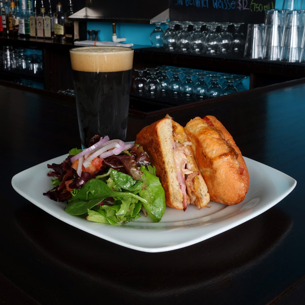 Brewmix Cube: Pork shoulder, ham, provolone cheese, dill pickles, mustard BBQ sauce. Served on crusty French roll with garlic butter. $10