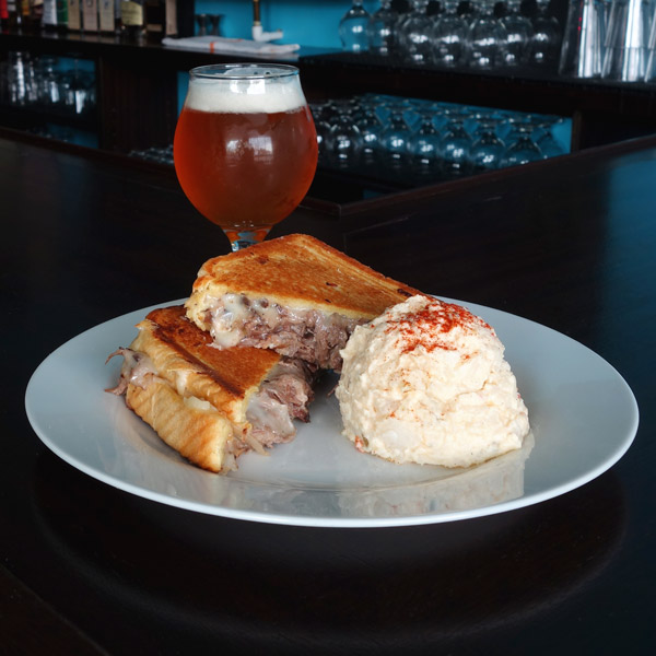 Short Rib Grilled Cheese: Tender short rib, Sour Note pickled peppers and onions, spicy tomatillo sauce, Monterey jack cheese. Served on thick garlic buttered toast. $10
