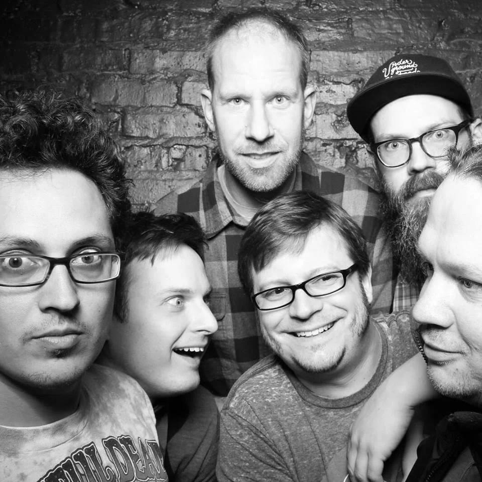 \\ Wild Jesus & The Devil's Lettuce // The blues, jazz, and funk fusion ensemble Wild Jesus & The Devil’s Lettuce Family Party Band have been lurking around the weird back alleys of Chicago’s avant-garde indie music scene since at least 2011. They’ve released a number of madman LPs infused with Tom Waitsian growls, Steve Reich style experimentation, and a flavor of neo-psychedelia that’s trippier than a mushroom experience at a planetarium on Mars.