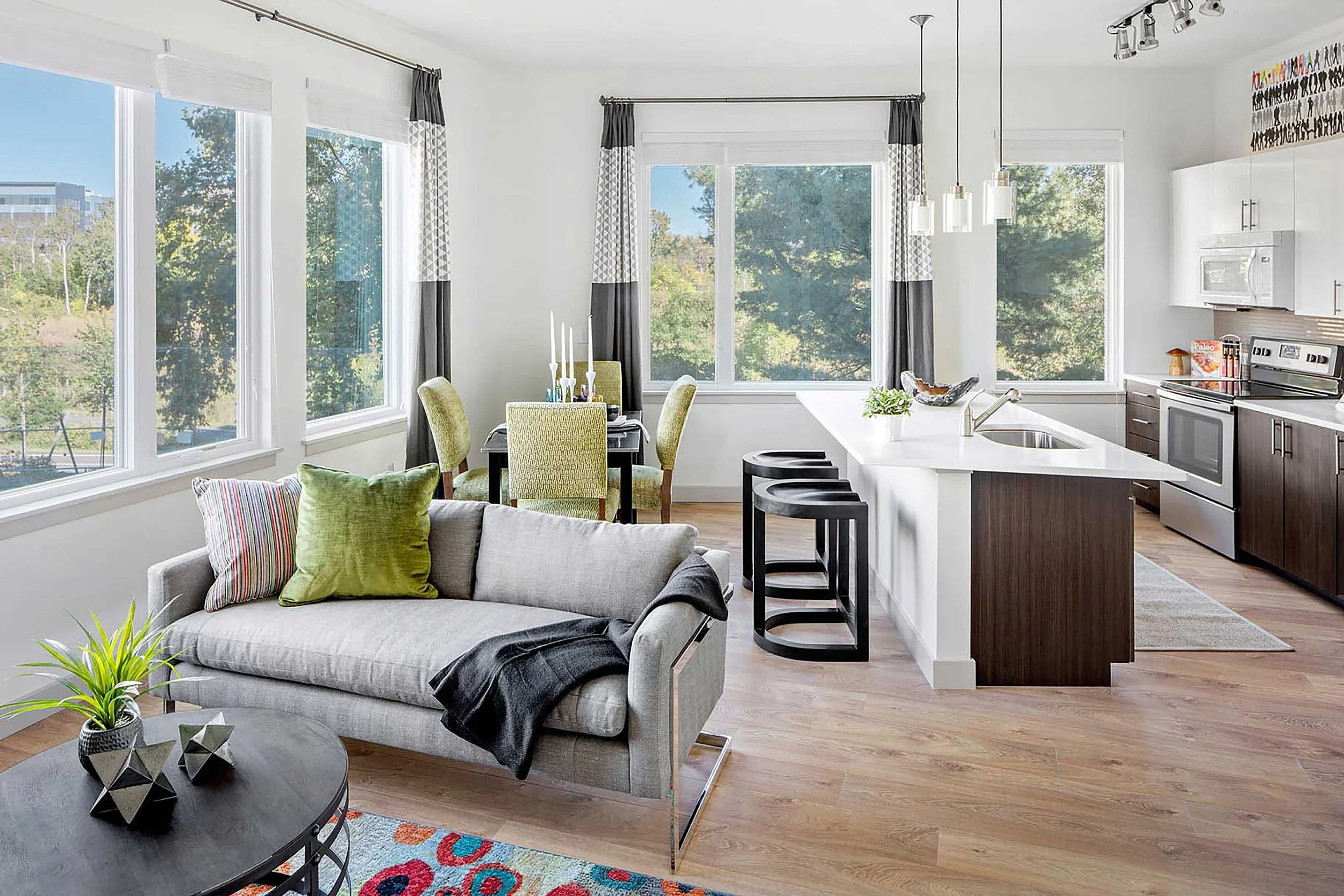 A modern apartment design with contrasting white and rich brown tones.