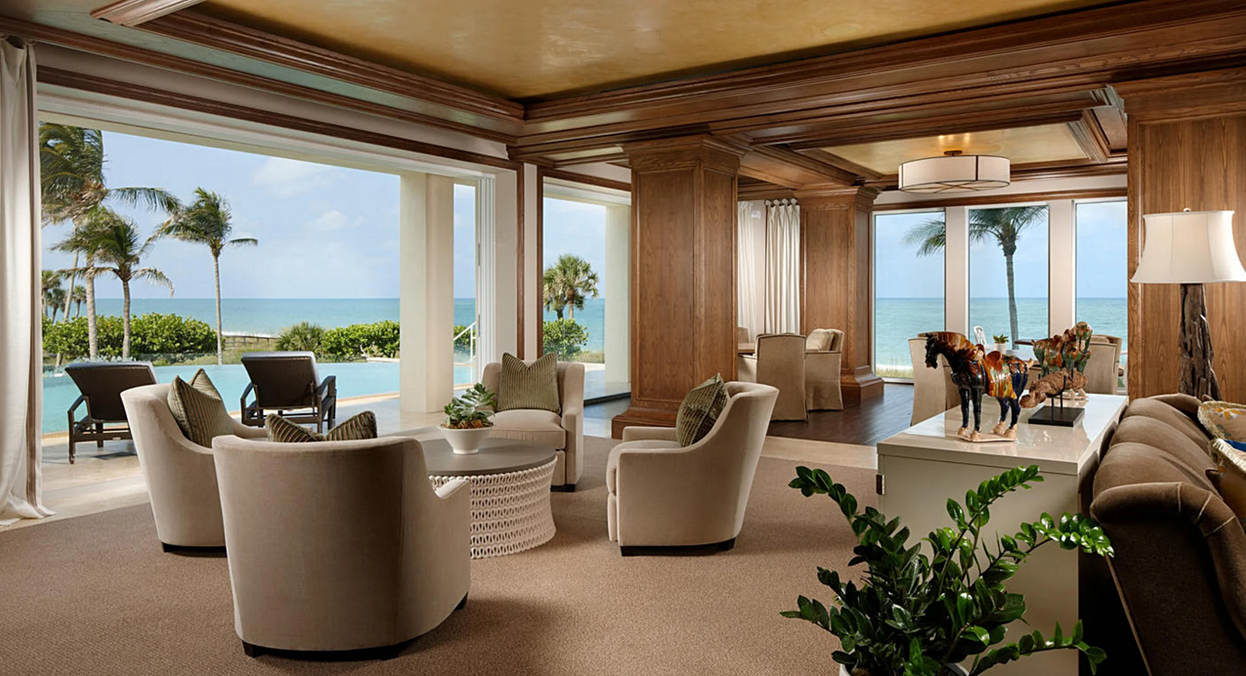 The clubhouse encompasses a modern vibe with medium wood tones with a monochromatic vibe. The color palette incorporates neutral shades of caramel, cream with pops of cinnamon.