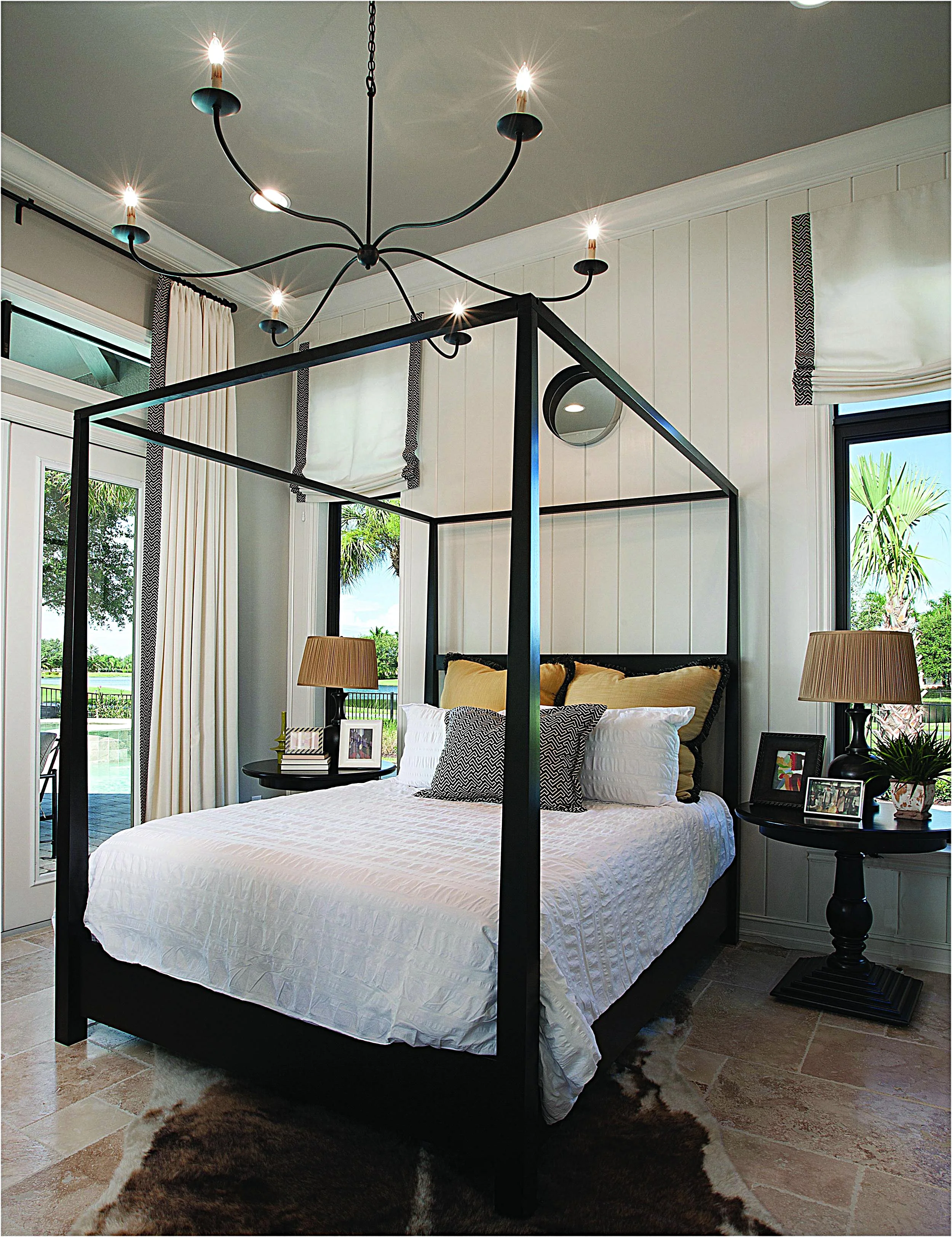 The subtly glamorous modern styled bedroom captures the essence of coast living in a prestigious beachside enclave in Naples, FL.