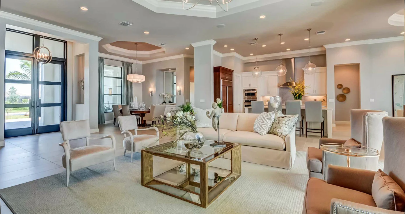 The casual atmosphere is complimented by transitional furnishings with touches of reflective elements in the cocktail table and light fixtures.