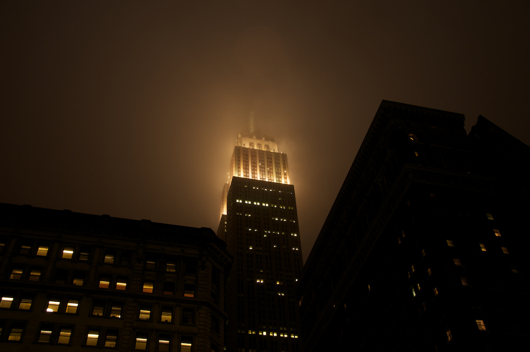 lighthouse empire state mind nyc new york city manhattan downtown fog night life light spooky mood.jpg
