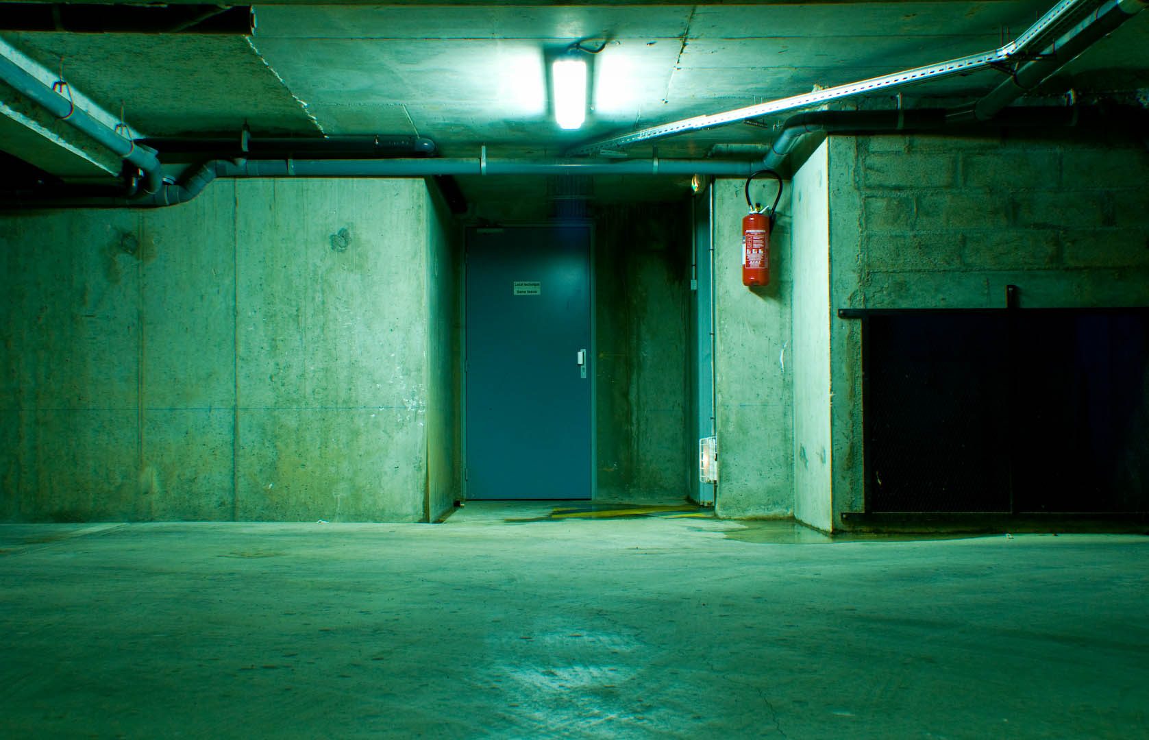 Parking lot underground france car green spooky mood oppressed scary fire extinguisher exit emergency.jpg