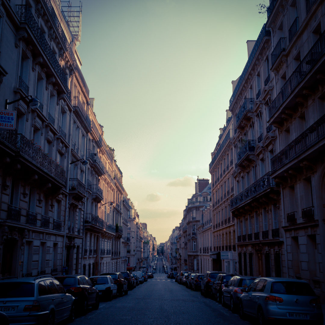 rue de monceau paris france building architecture haussmanien street car vintage purple sunset end of day.jpg