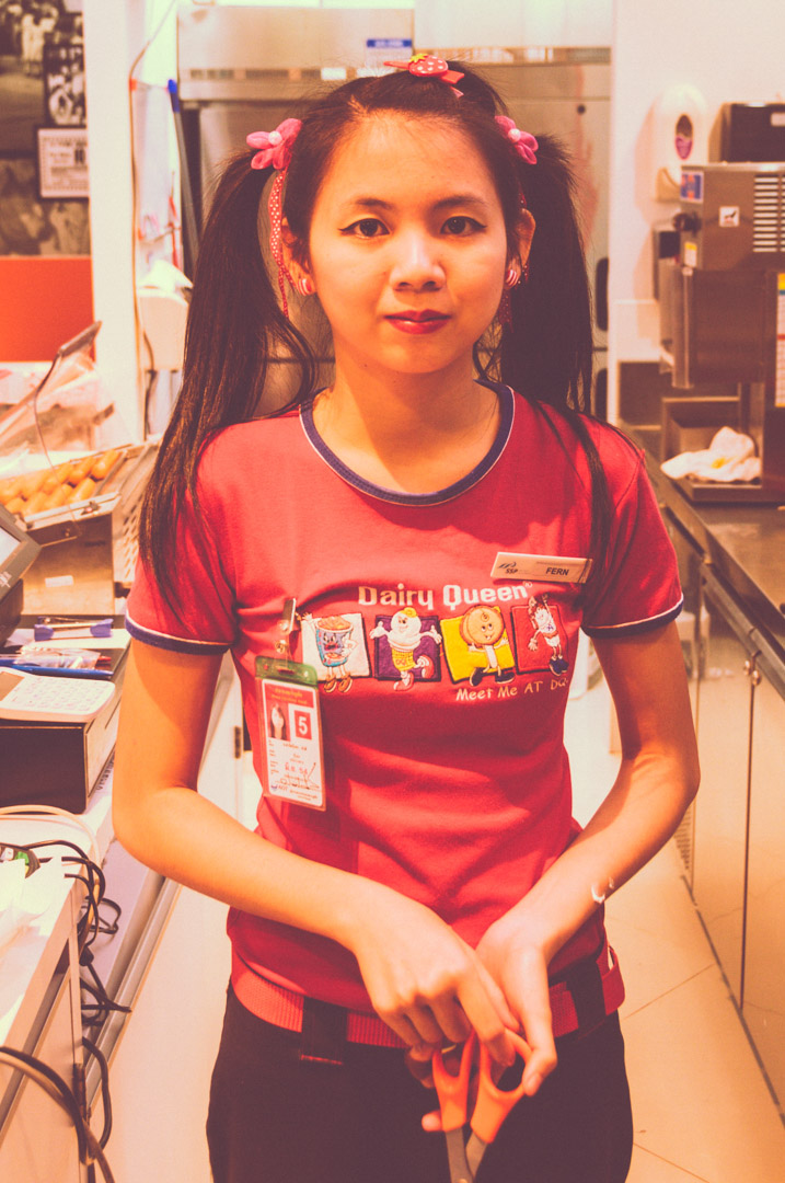 asian thailand person girl woman quenn fast food cashier people pink red sadness sad scissors dairy black hair smile.jpg